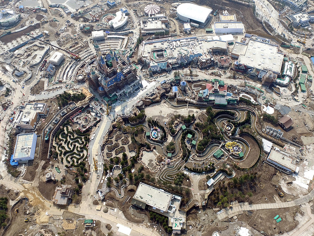 SHANGHAI, CHINA - FENRUARY 25: (CHINA OUT) Aerial view from an Unmanned Aerial Vehicle (UAV) shows Shanghai Disneyland Park is under construction on February 25, 2016 in Shanghai, China. Shanghai Disney Resort, a one-of-a-kind destination featuring Shanghai Disneyland which is the 6th in the world, 2 Resort hotels, Disneytown, Wishing Star Park and more, will welcome its grand opening on June 16, 2016. (Photo by VCG)***_***