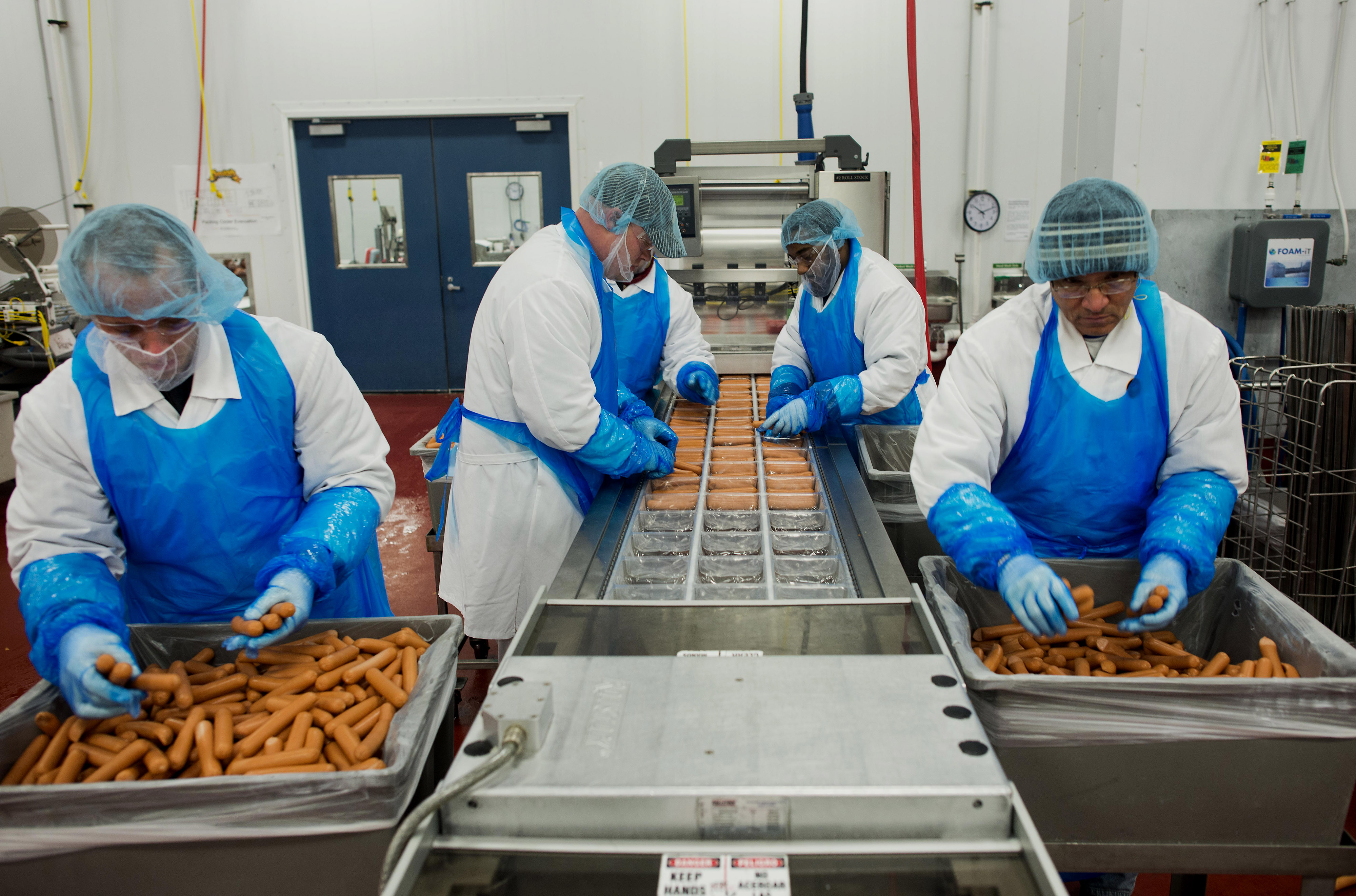 Hot Dog Production At Smith Provisions Co. As US Beef And Pork Exports Fall