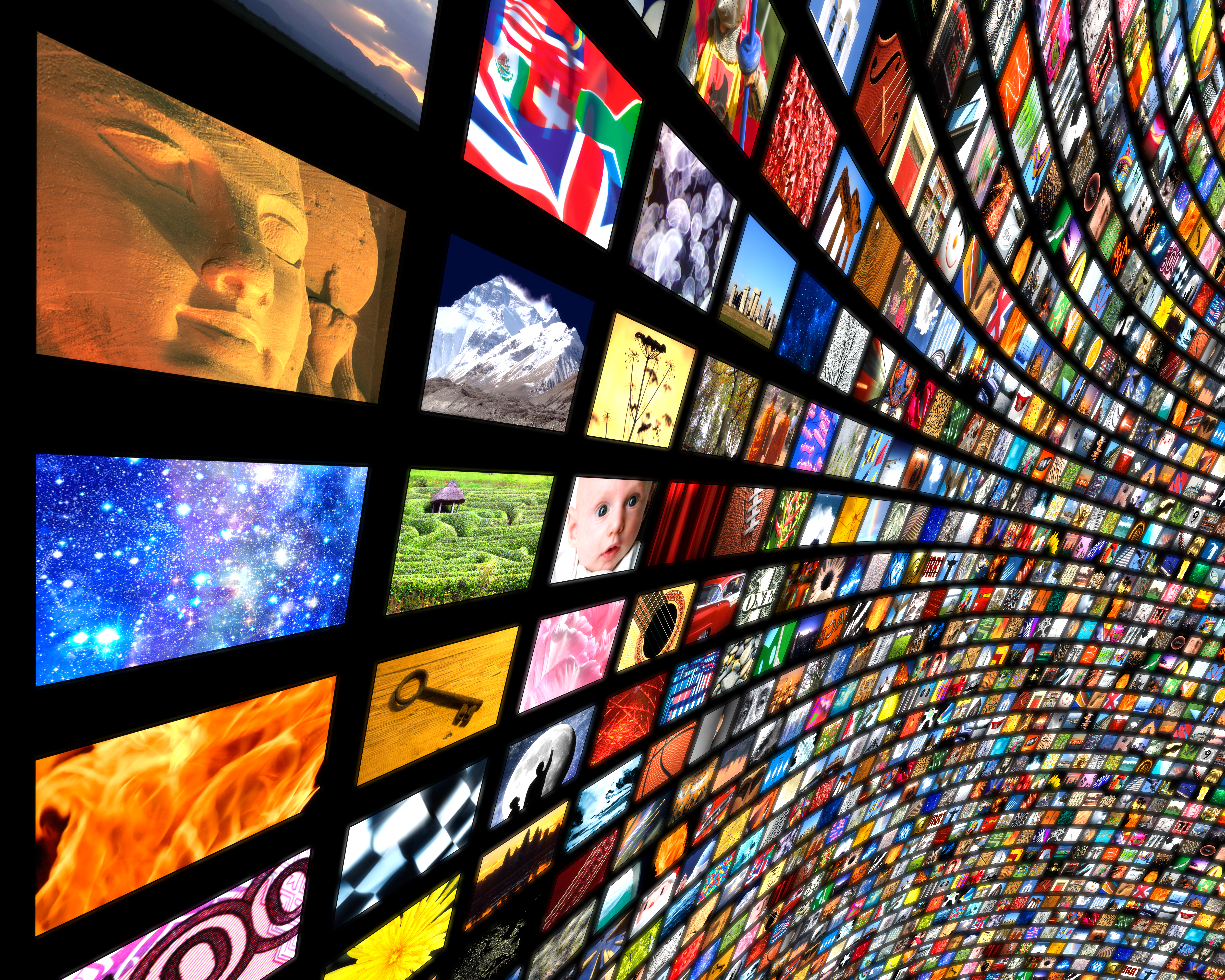 Multiple television/computer screens stretching to