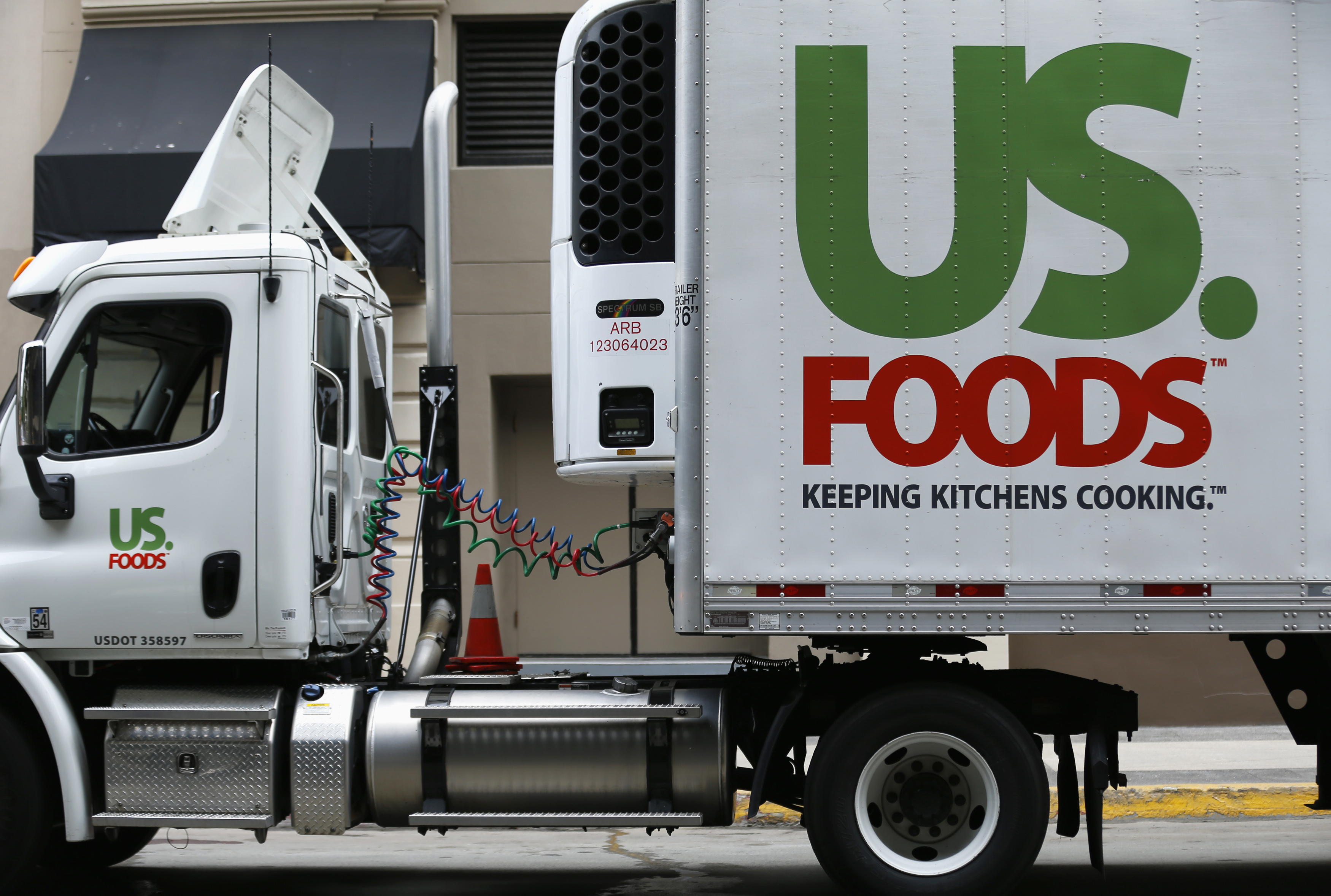 A US. Foods truck is shown on delivery in in San Diego
