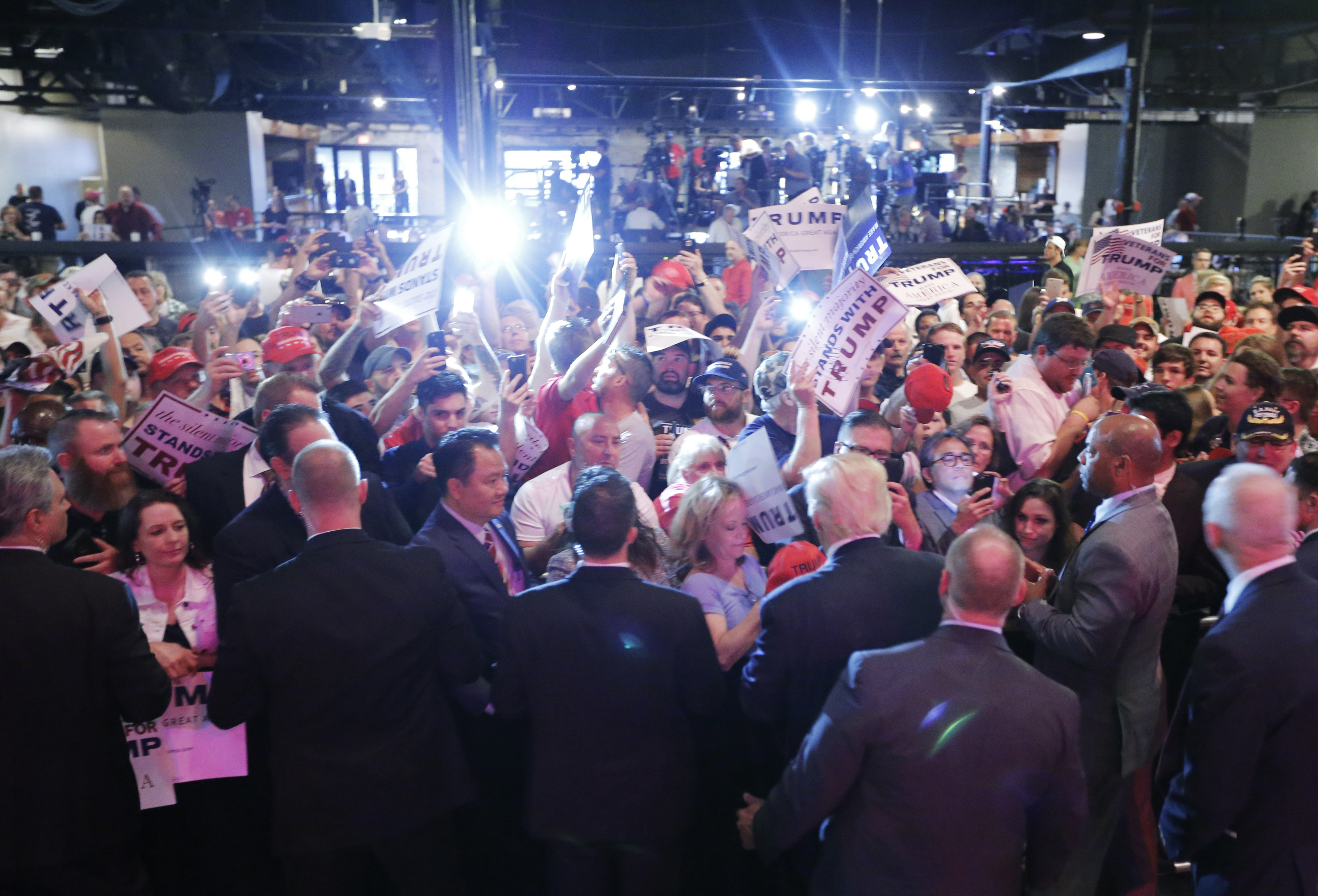 Republican U.S. Presidential candidate Donald Trump greets the crowd at a campaign rally at Gilley's in Dallas