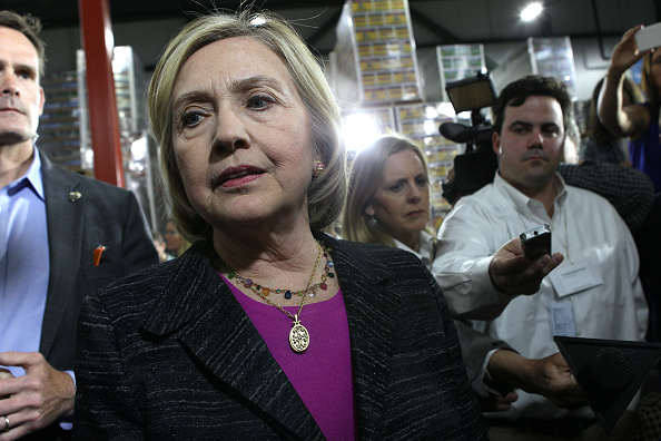 Hillary Clinton answers questions from the press about the Bengazi emails after a discussion with members of the local small community at Smuttynose Brewery, in Hampton, N.H. (Photo by Joanne Rathe/The Boston Globe via Getty Images)