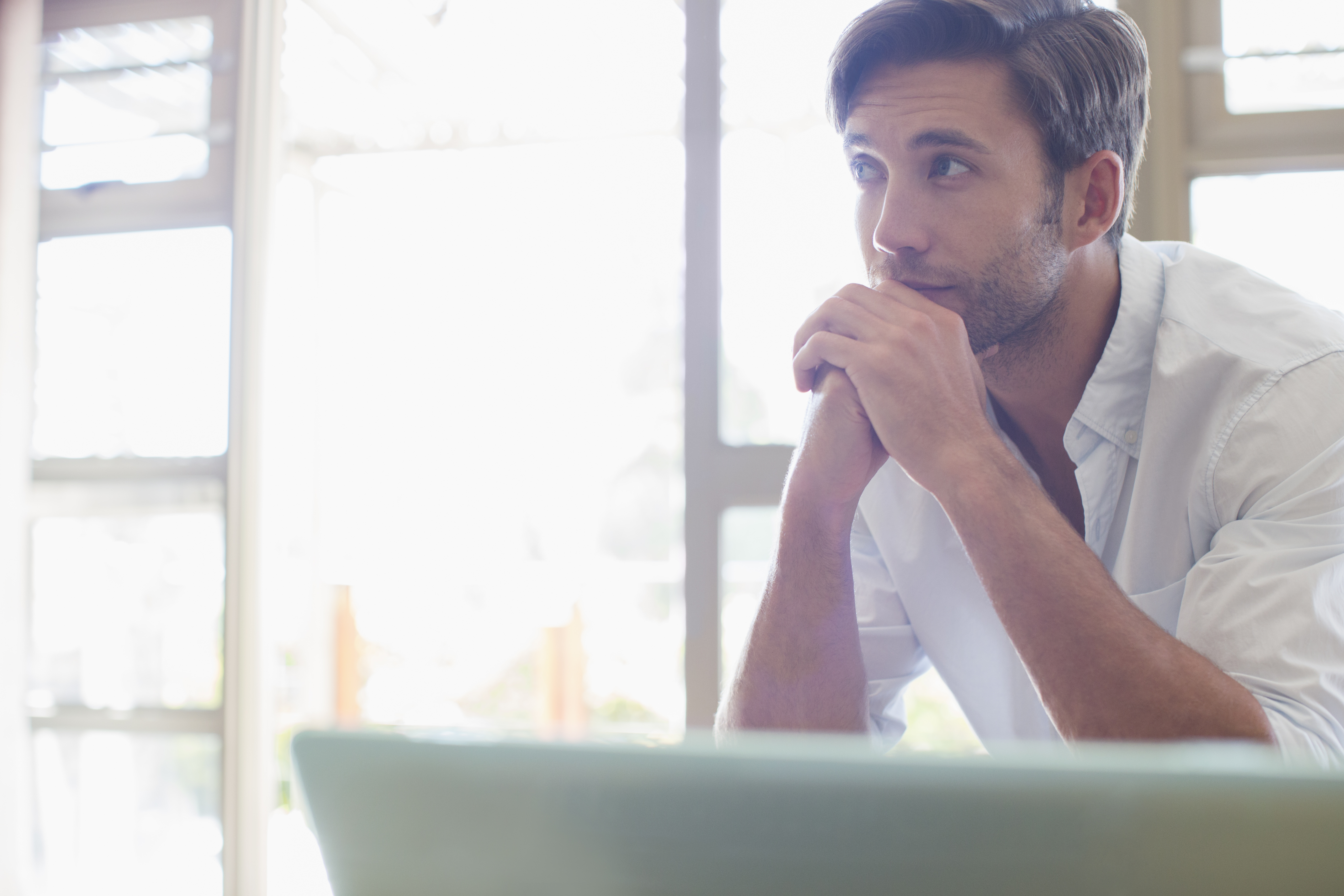 Man sitting at laptop