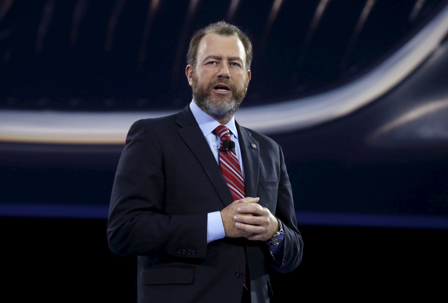 General Motors President Ammann addresses the media before the start of the North American International Auto Show in Detroit
