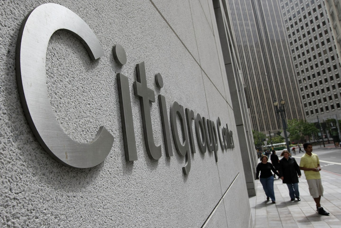 Pedestrians walk by the Citigroup Center San Francisco.