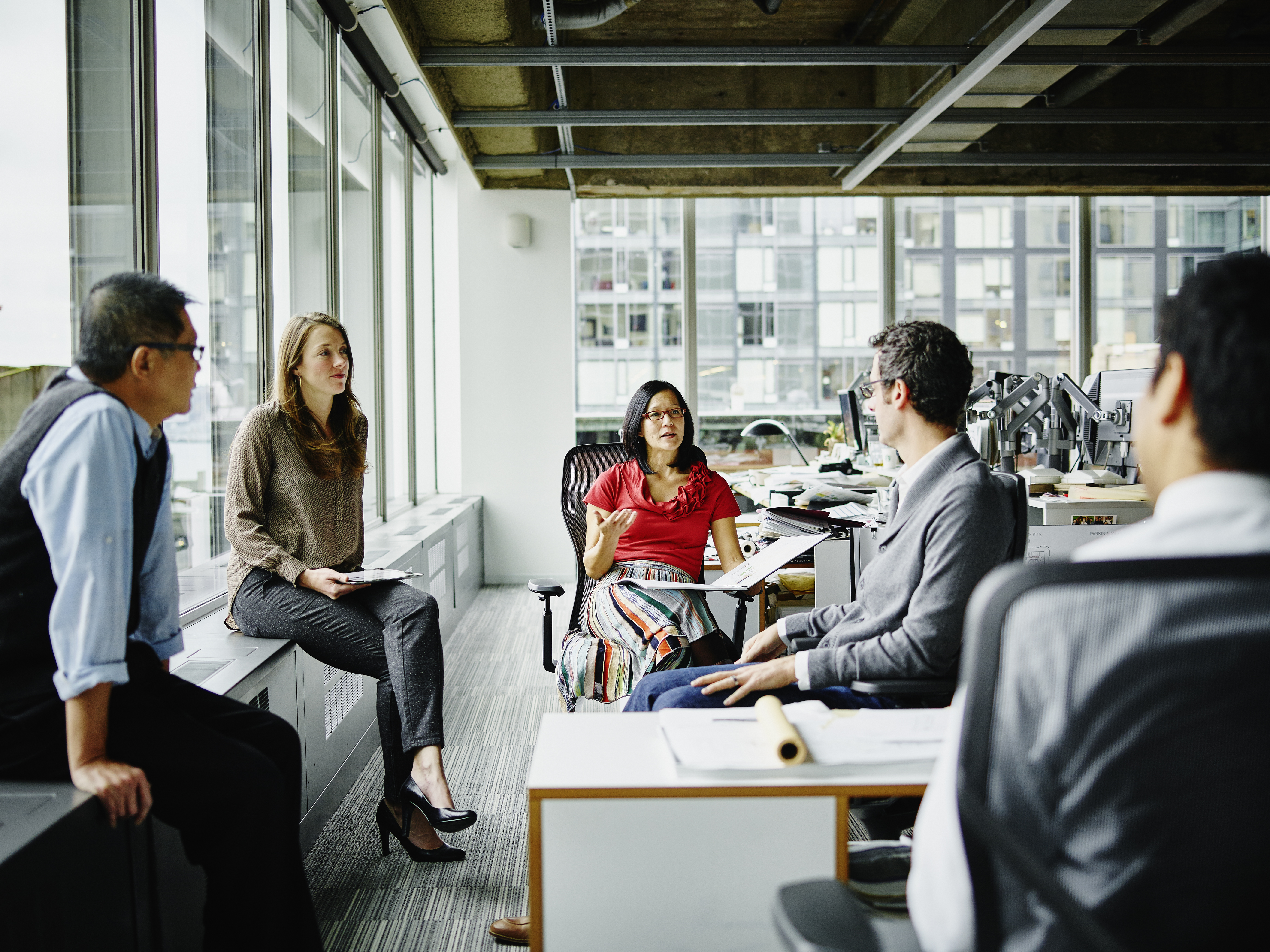 Team of architects having group project discussion