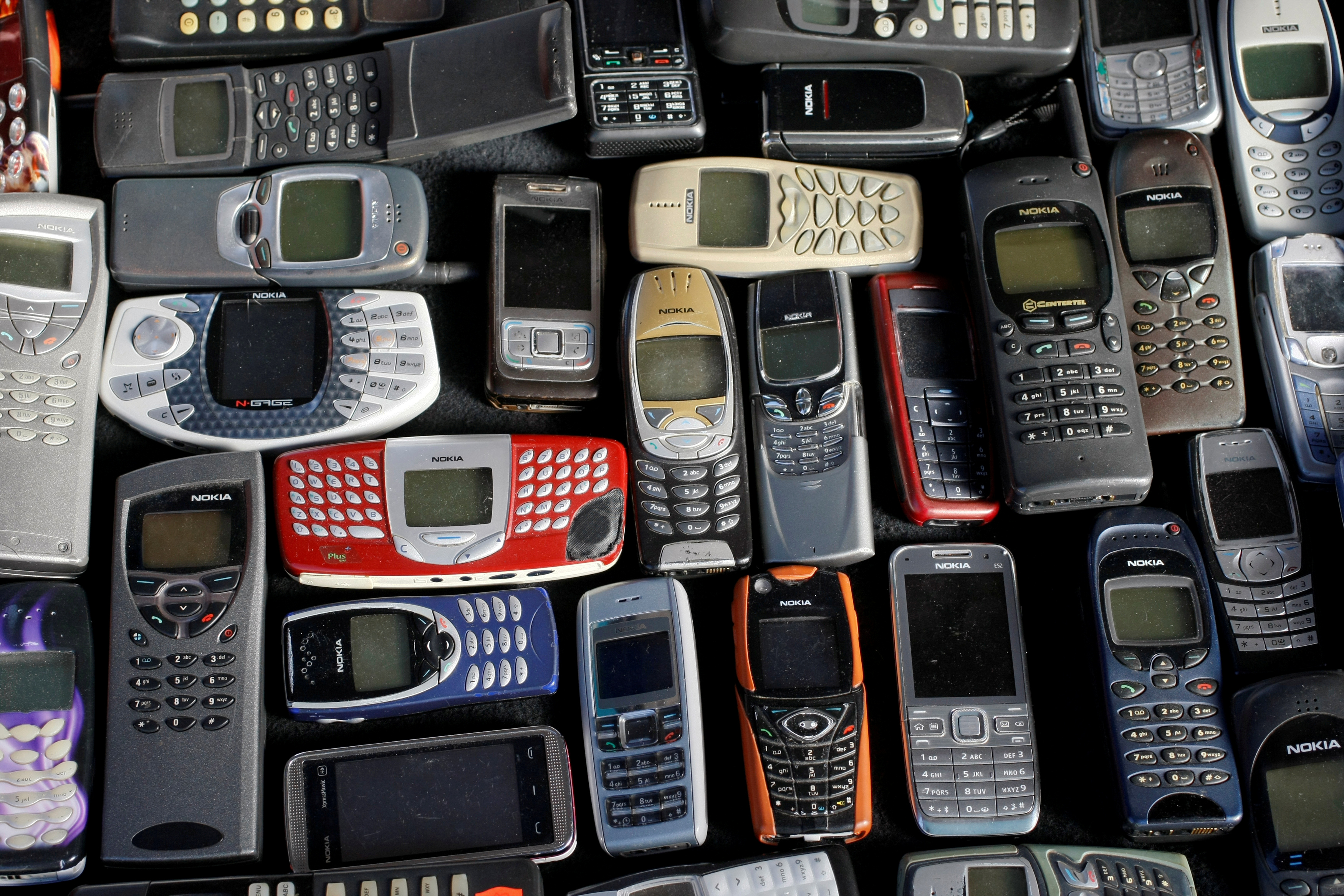 Photo illustration of a collection of mobile phones made by Nokia