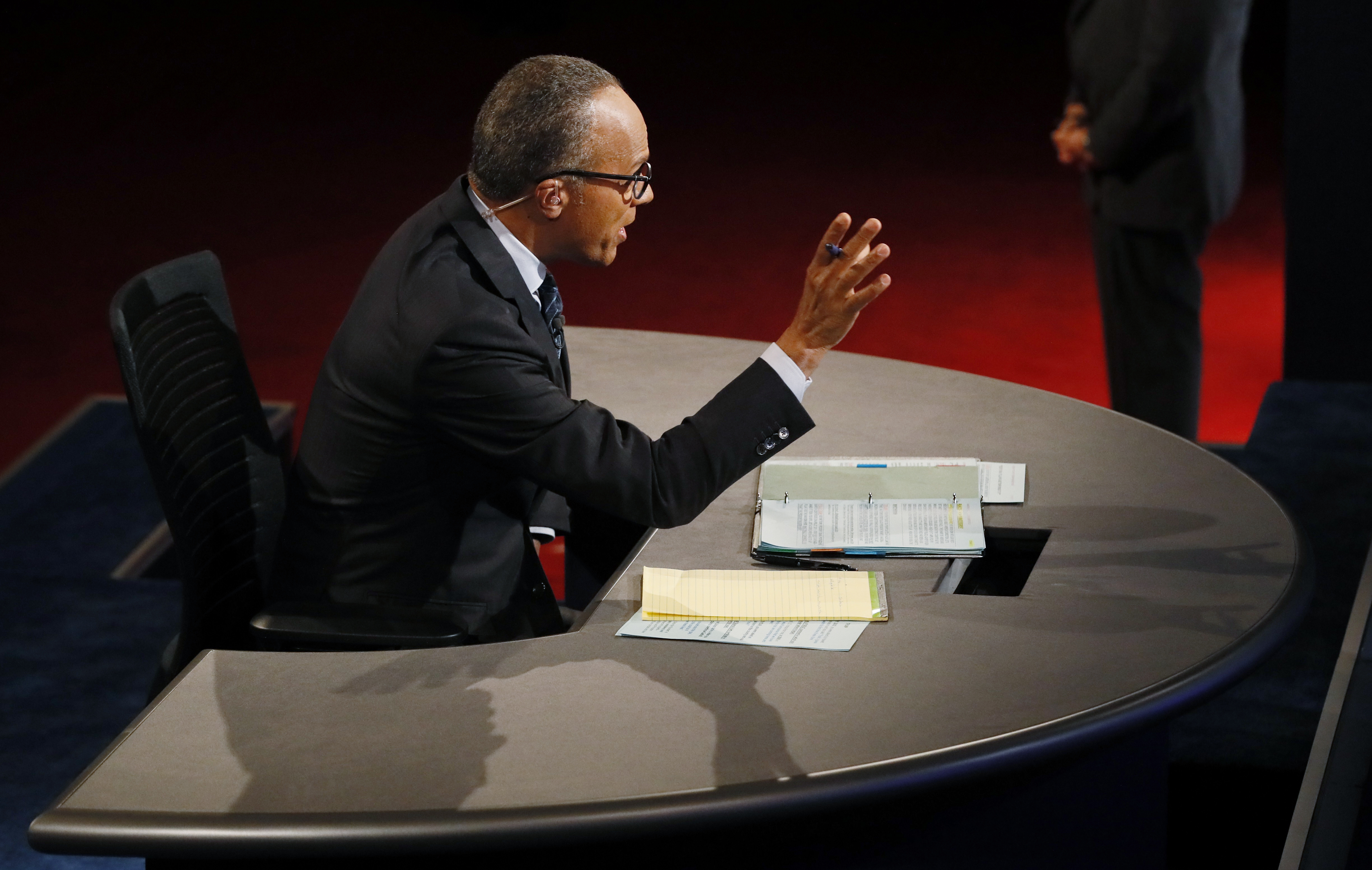 Moderator Lester Holt speaks during the first presidential debate between Democratic U.S. presidential nominee Hillary Clinton and Republican U.S. presidential nominee Donald Trump at Hofstra University in Hempstead