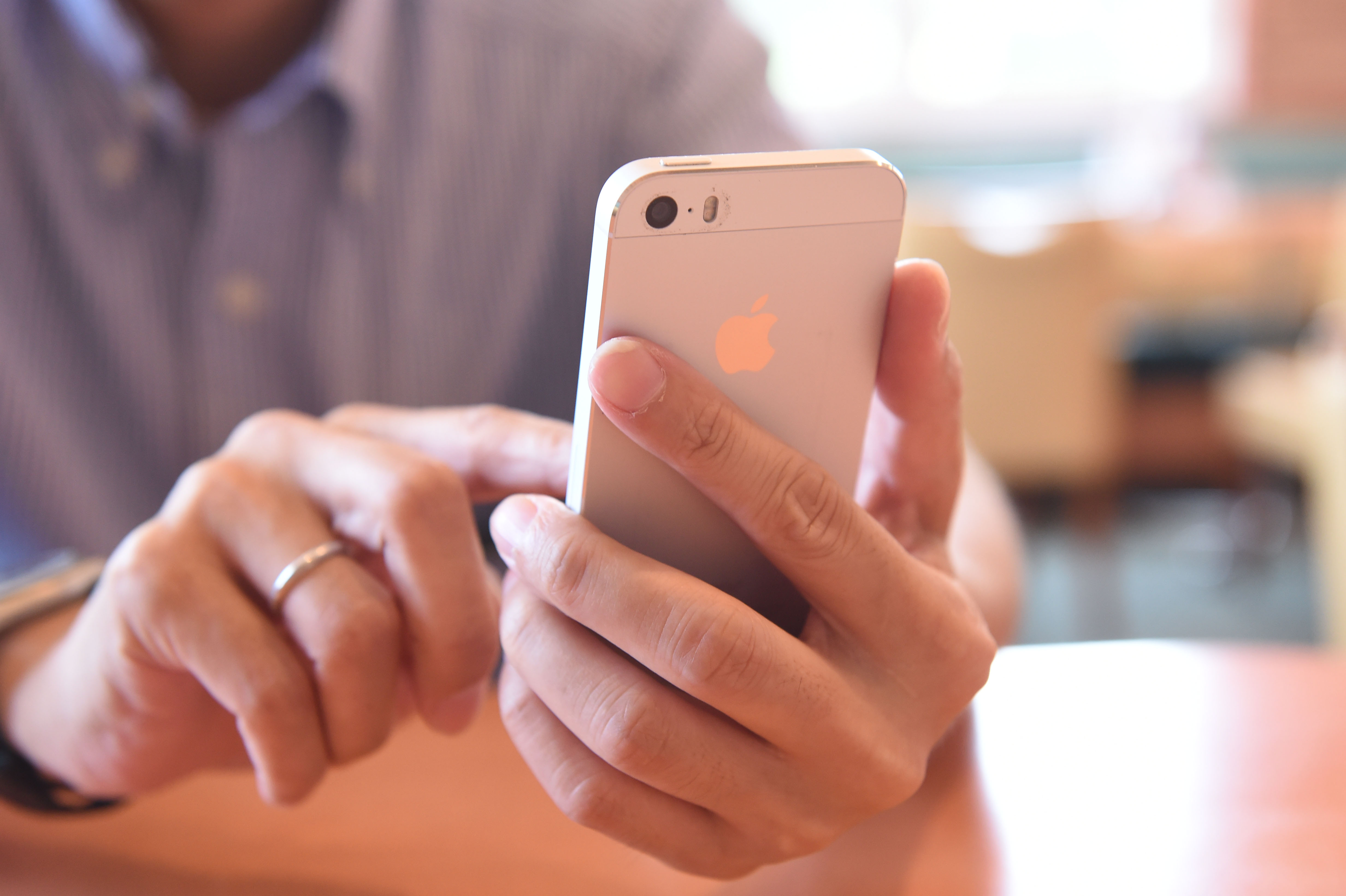 A man uses his smartphone.