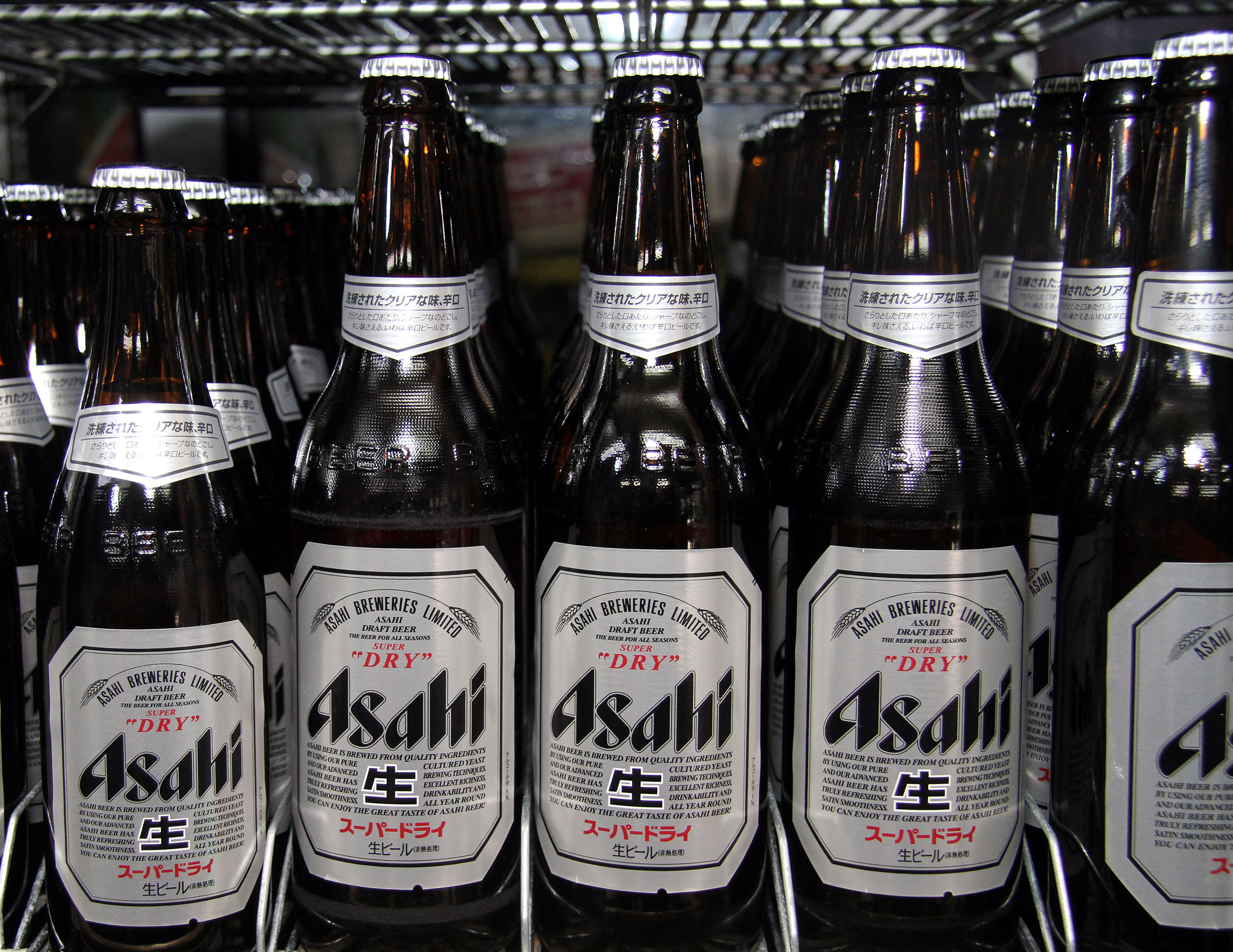Bottles of Asahi Breweries Ltd.'s Super Dry beer are display