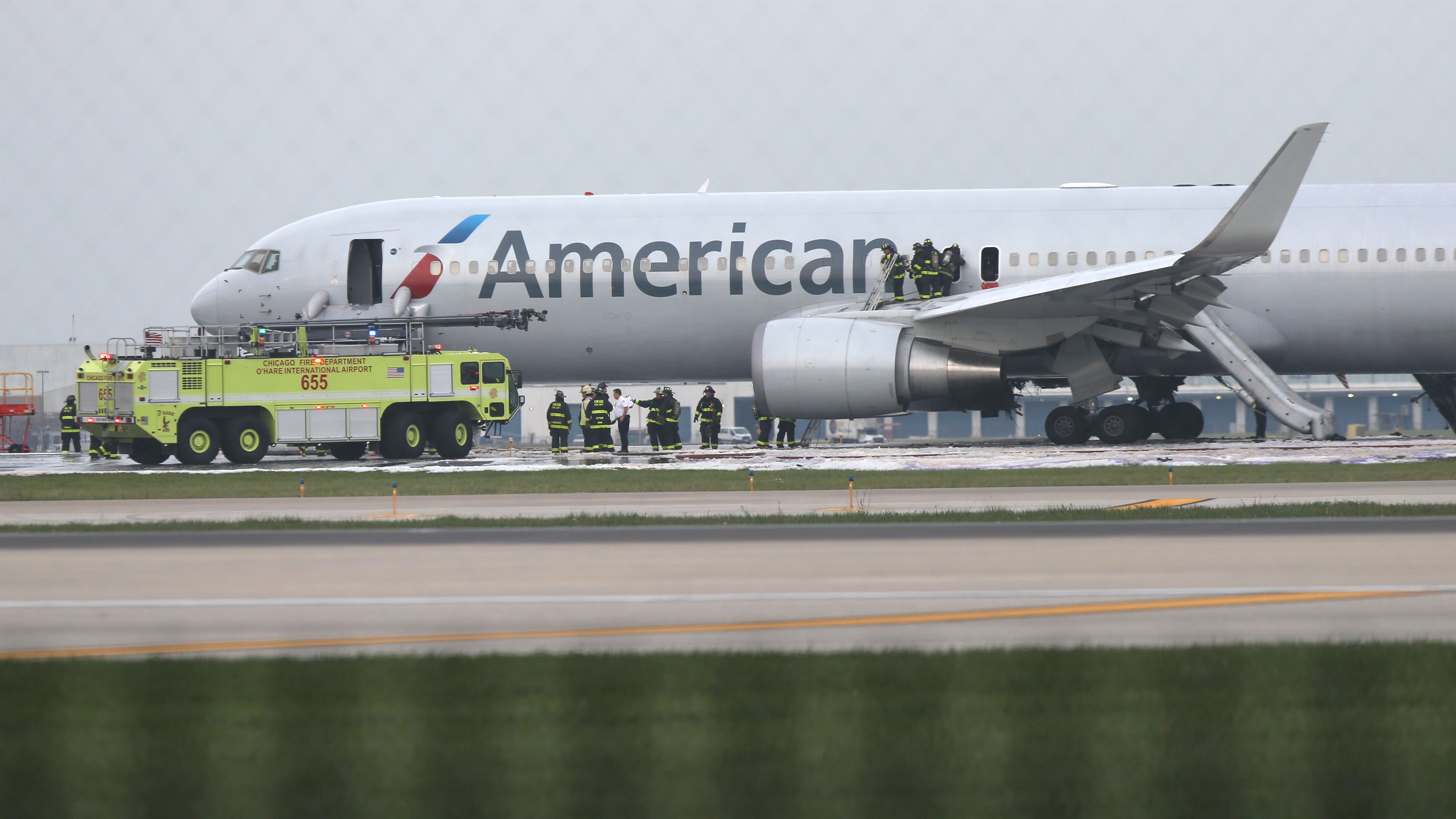 8 injured when plane catches fire on runway at O'Hare