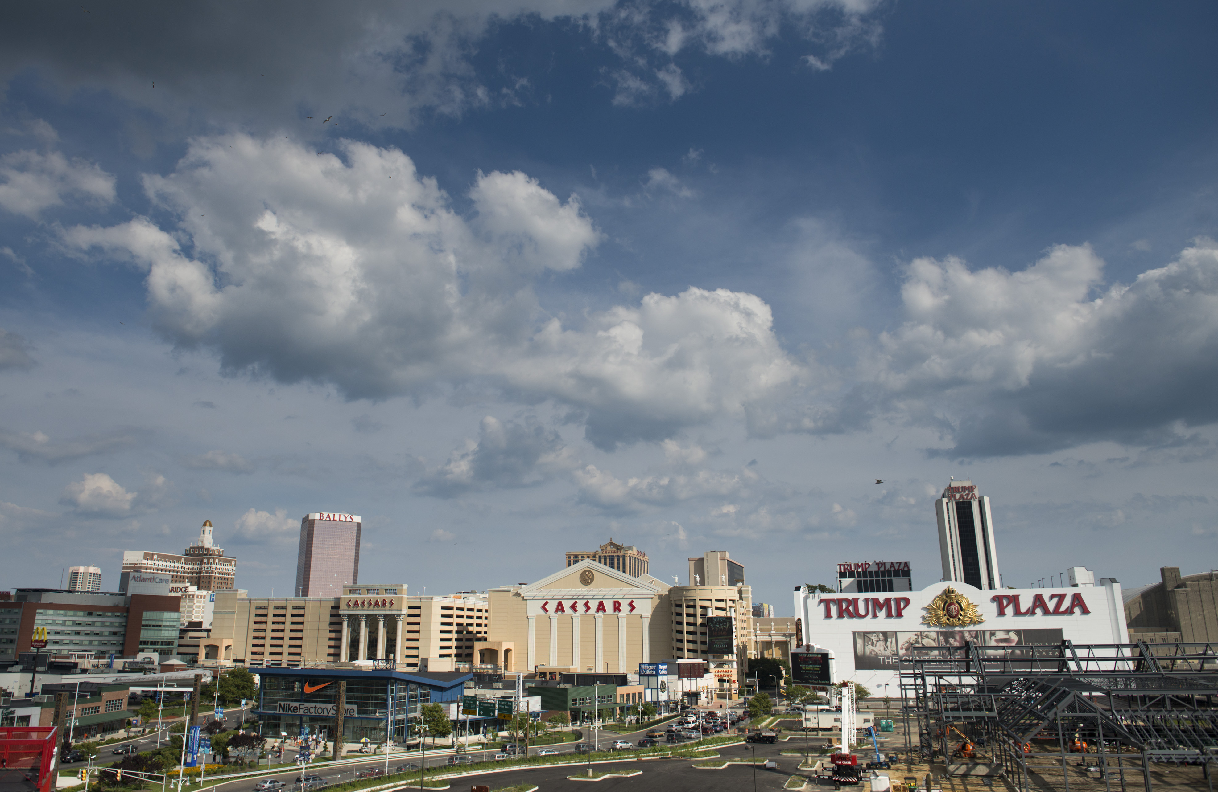 Caesars Entertainment, Atlantic City Hotel and Casino, and the Trump Plaza Hotel and Casino stand in Atlantic City, New Jersey, U.S., on Thursday, July 17, 2014.