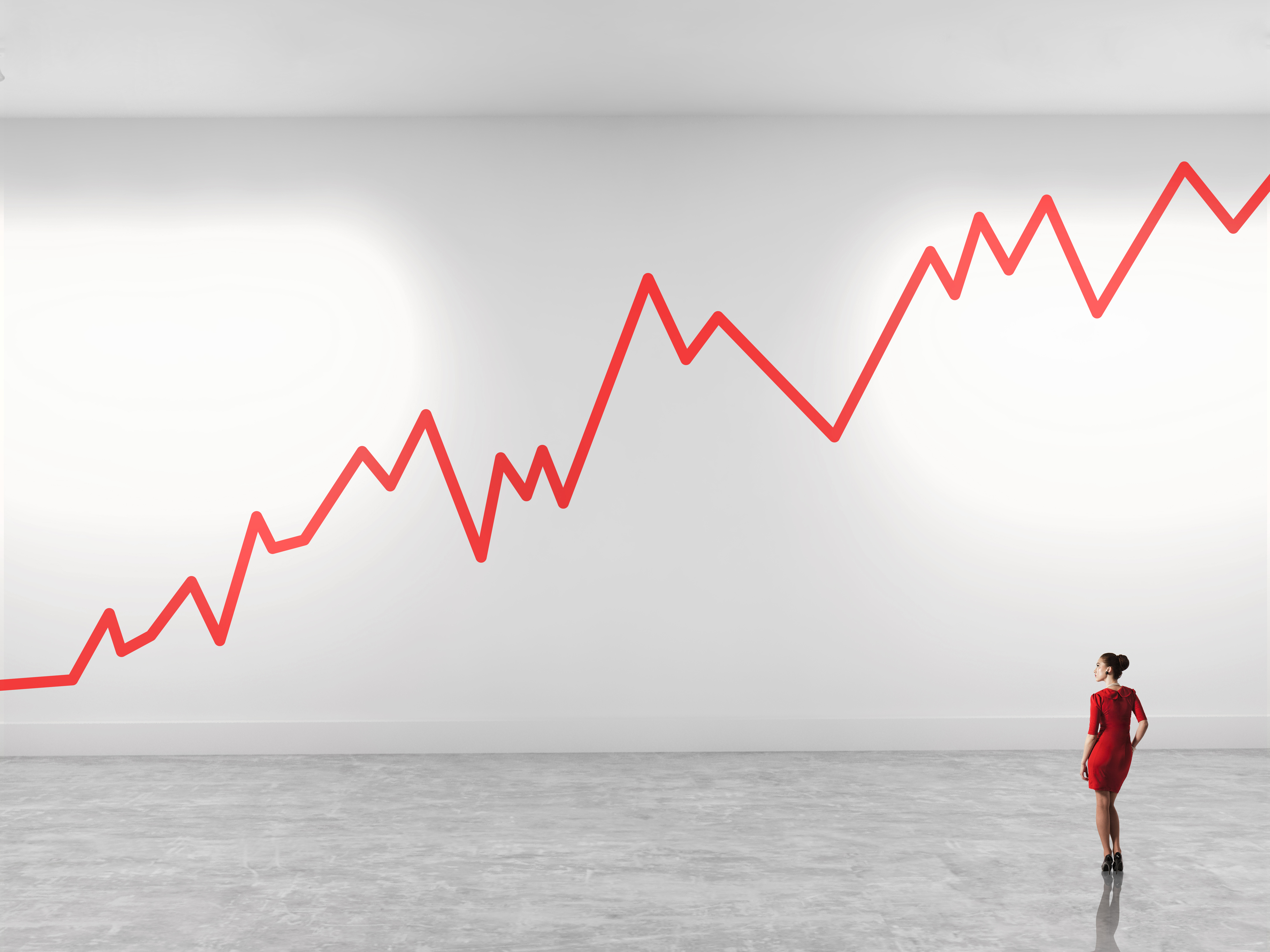 Woman looking up at zig zag line in gallery