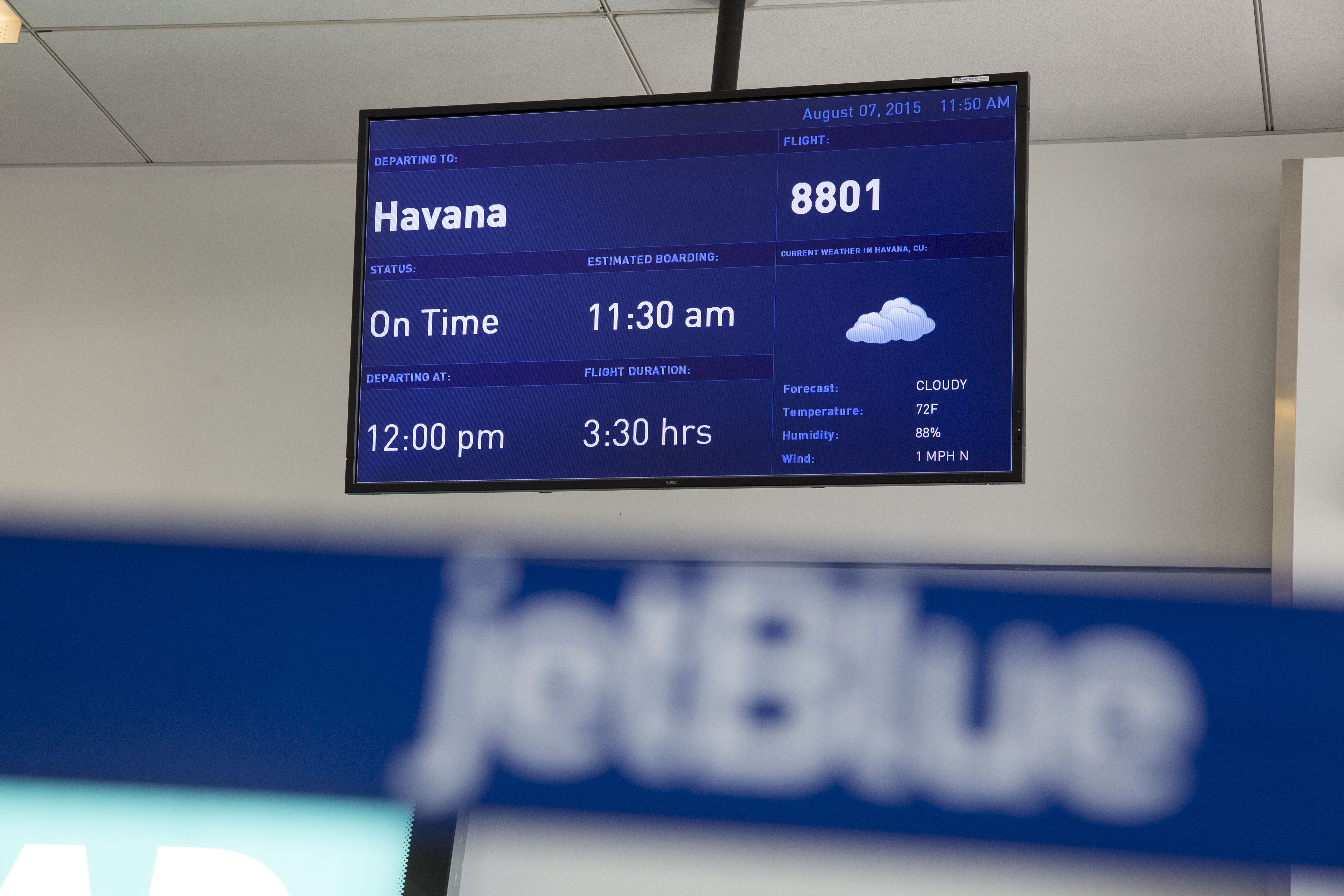 A direct flight to Havana, Cuba, is listed on a screen in JetBlue Airways’ terminal at John F. Kennedy International Airport (JFK) airport in New York.