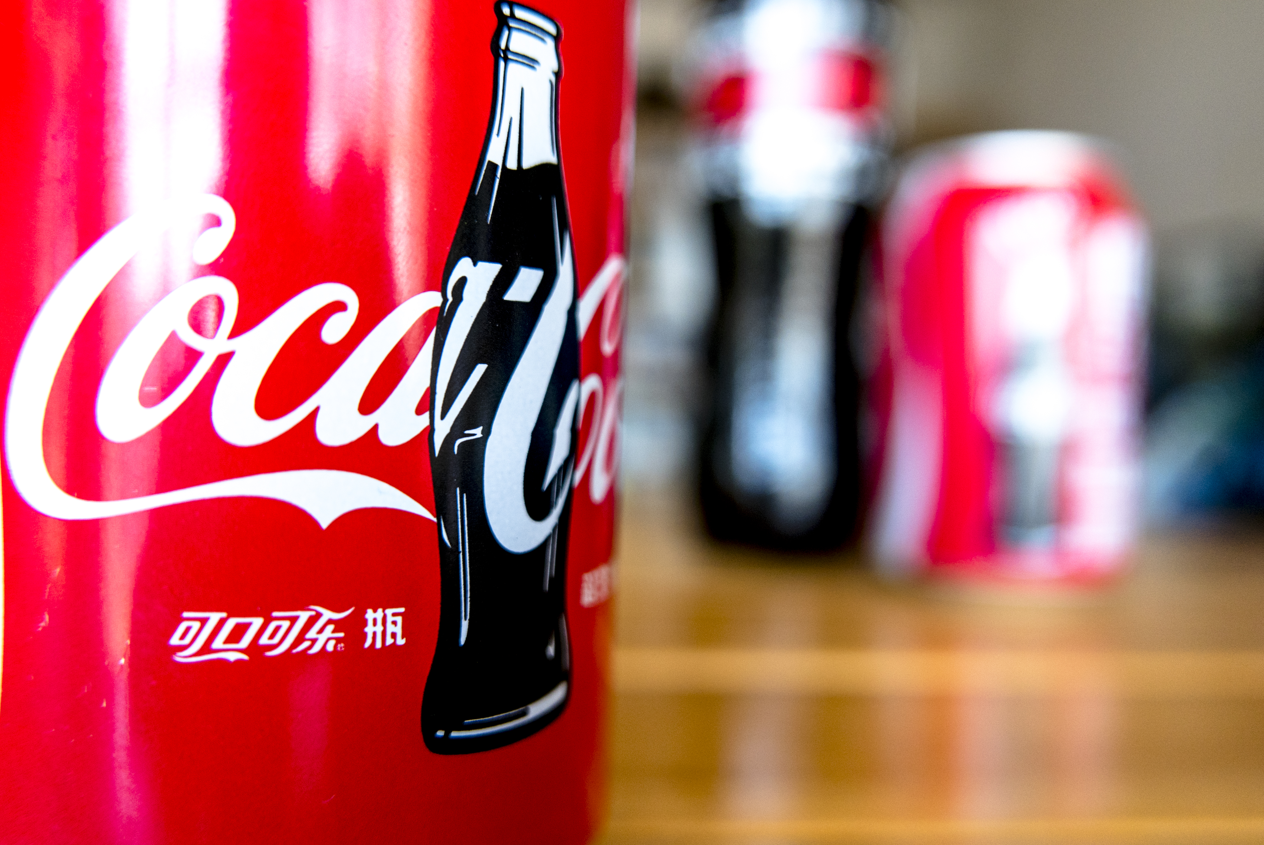 Logo of Coca-Cola on a bottle. The strong dollar hit Coca-