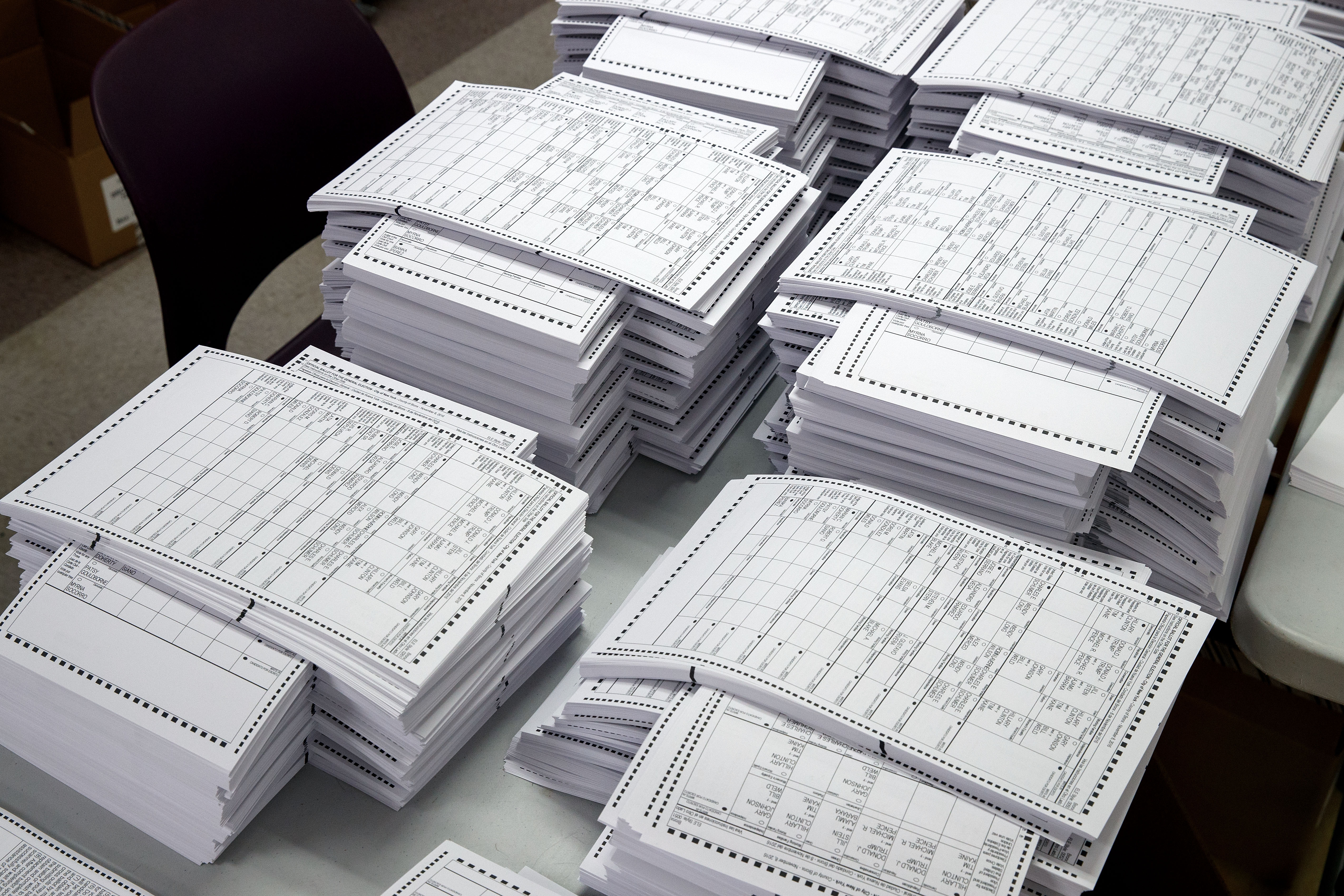 Test ballots wait to be scanned at a Board of Elections Elections voting machine facility warehouse, November 3, 2016 in the Bronx borough in New York City.