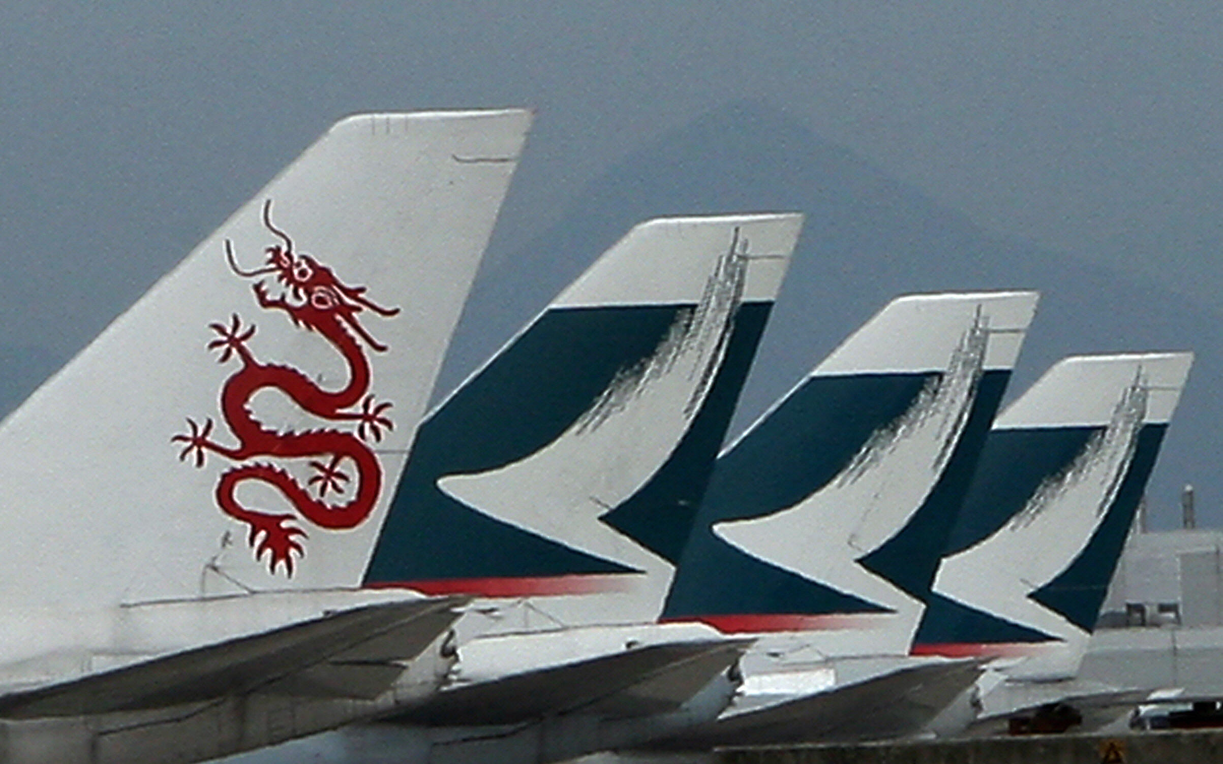 Dragon air (L) and Cathay Pacific planes
