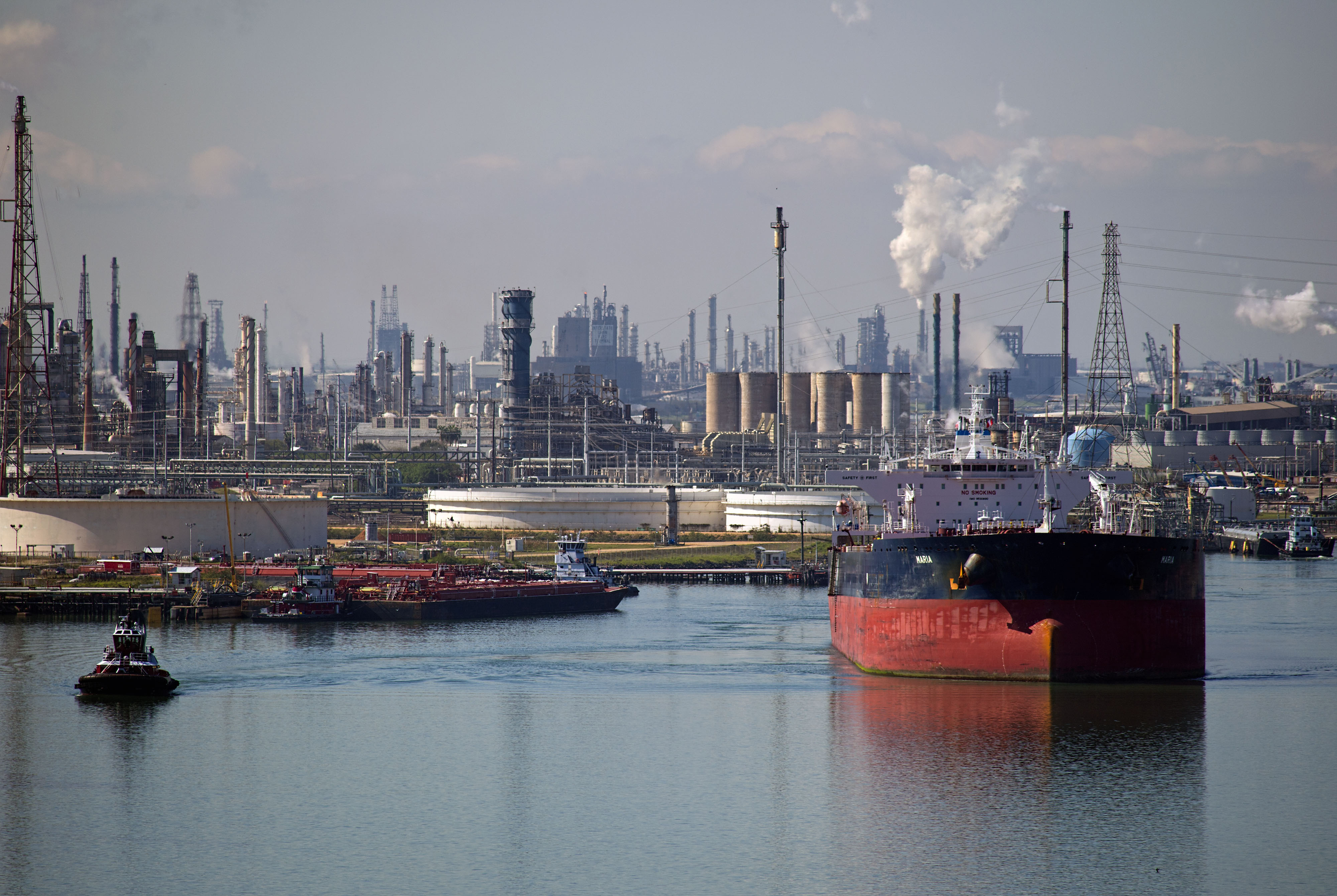 Views Of Tankers &amp; Refineries As Oil Trades Near 12-Year Low