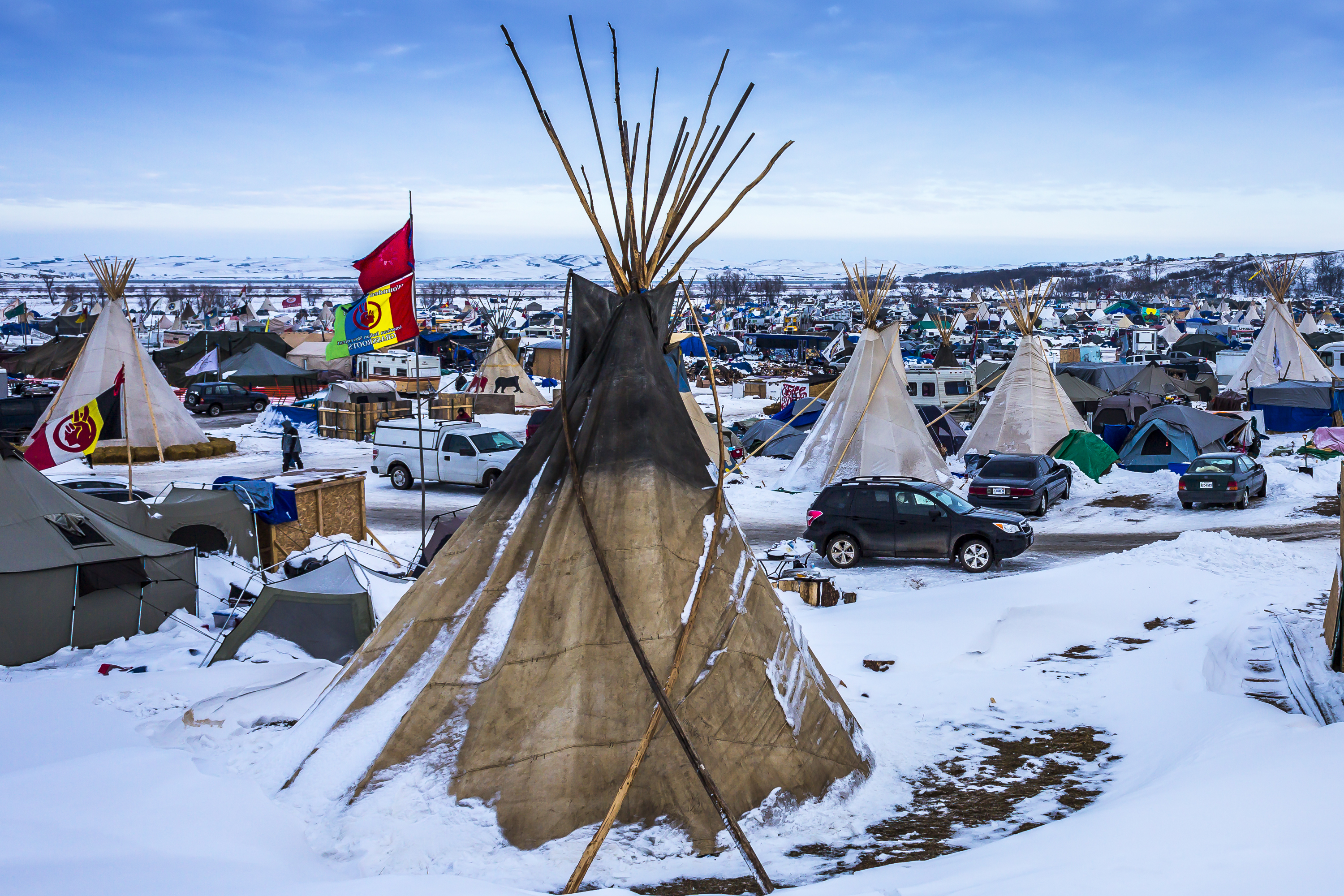 An estimated ten thousand water protectors, both indigenous