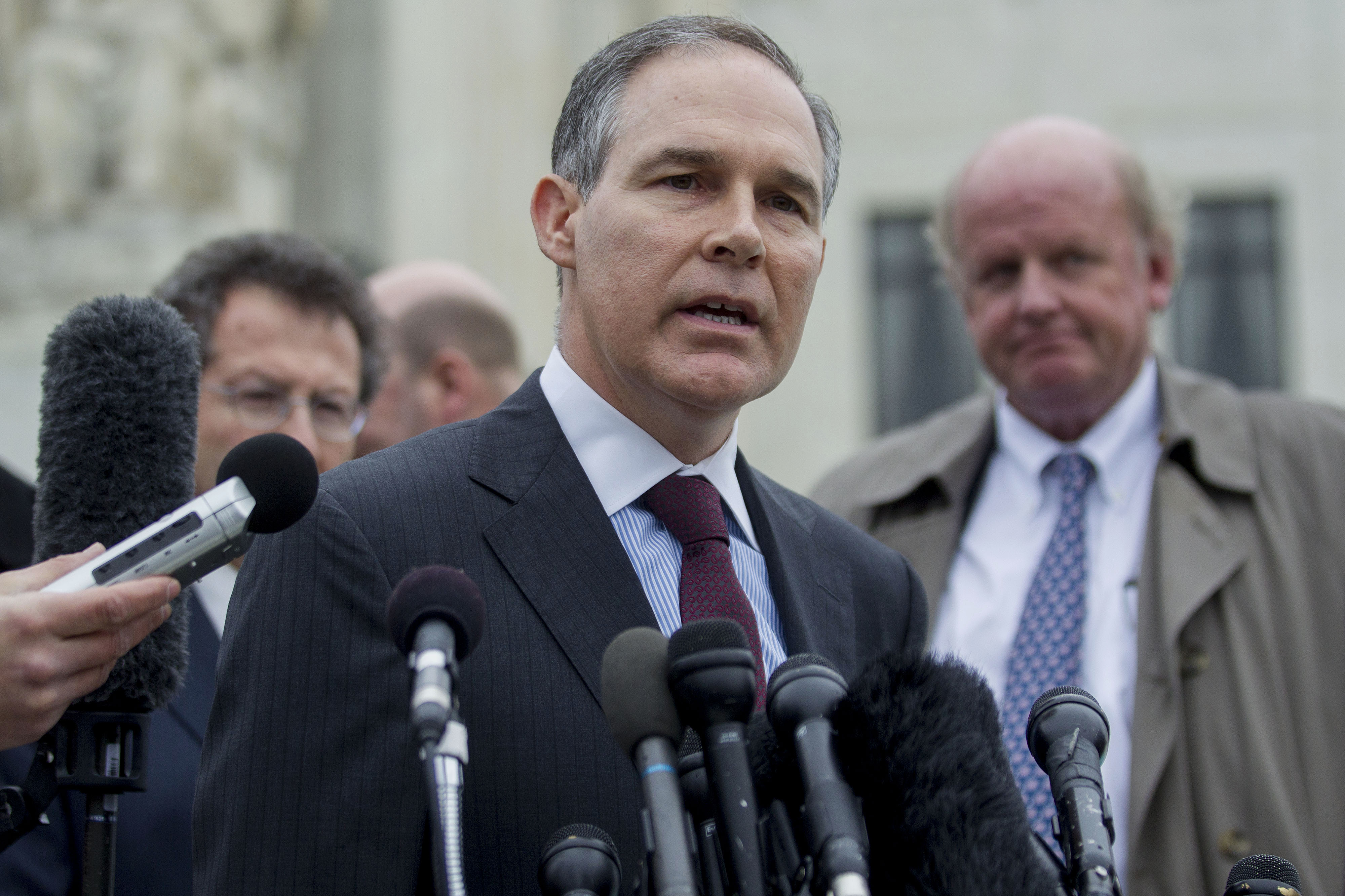 Scott Pruitt, attorney general of Oklahoma. speaks to the media in front of the U.S. Supreme Court in Washington, D.C., U.S., on Wednesday, March 4, 2015.