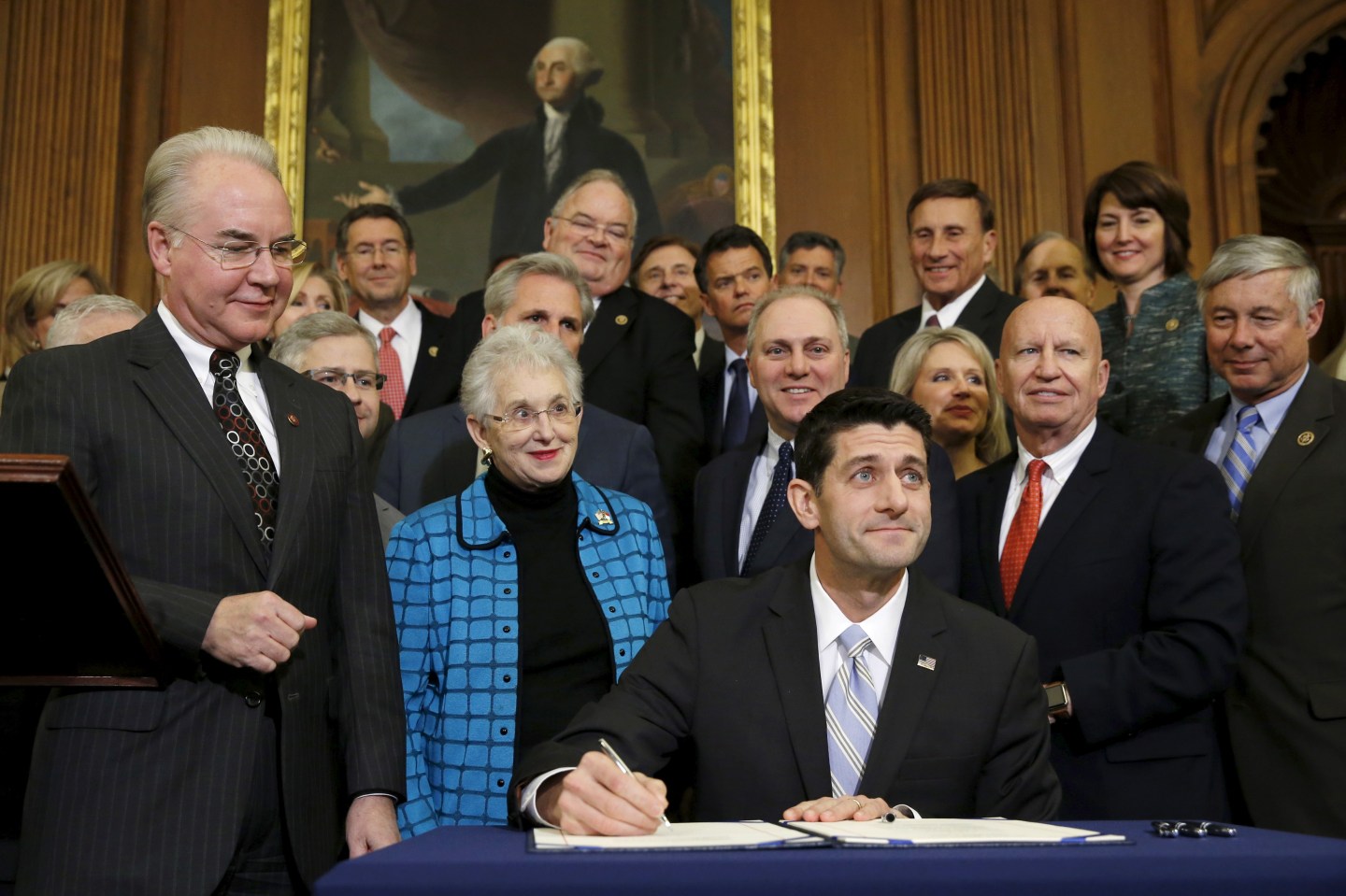 Ryan signs a bill repealing Obamacare at the U.S. Capitol in Washington