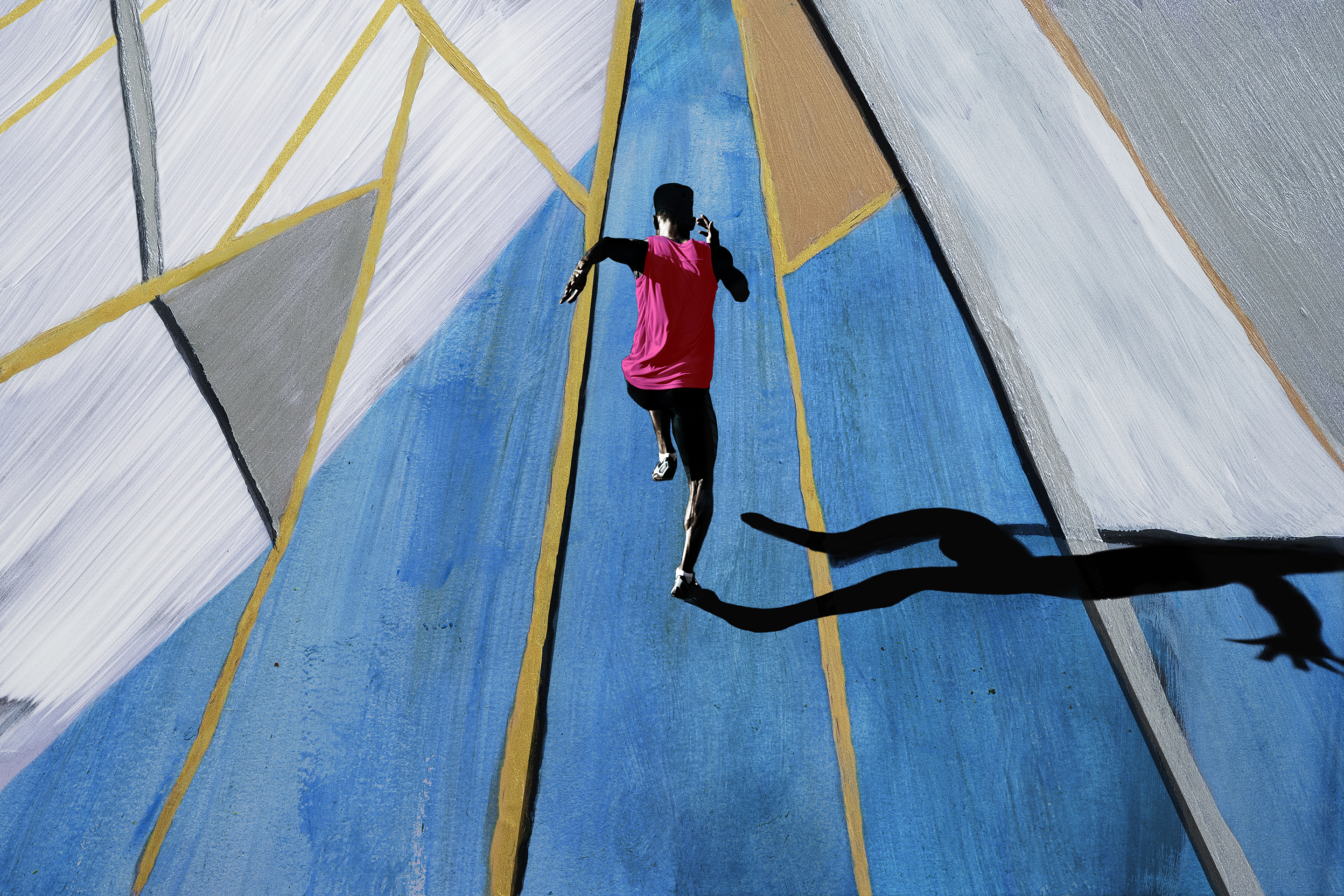 Male athlete sprinting, shot from above