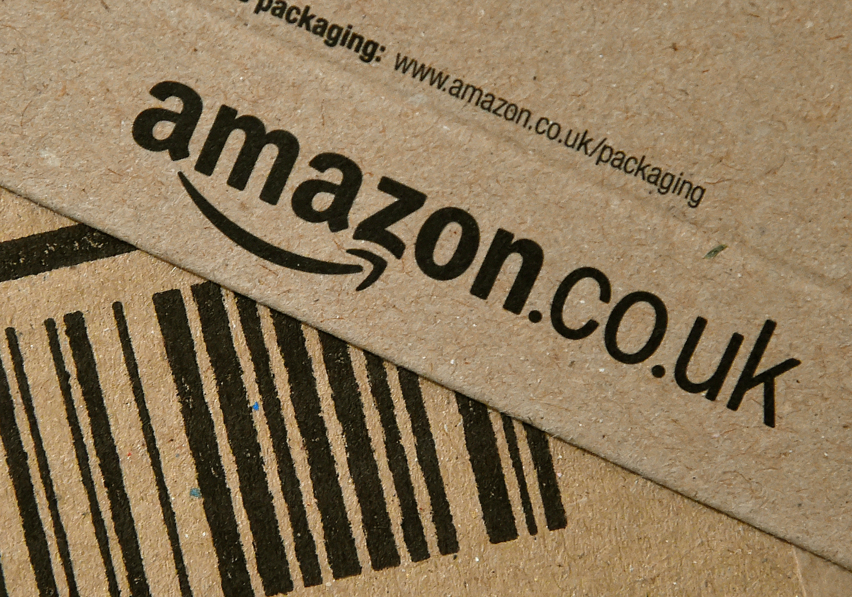 FILE PHOTO: An Amazon package is seen after being delivered in London