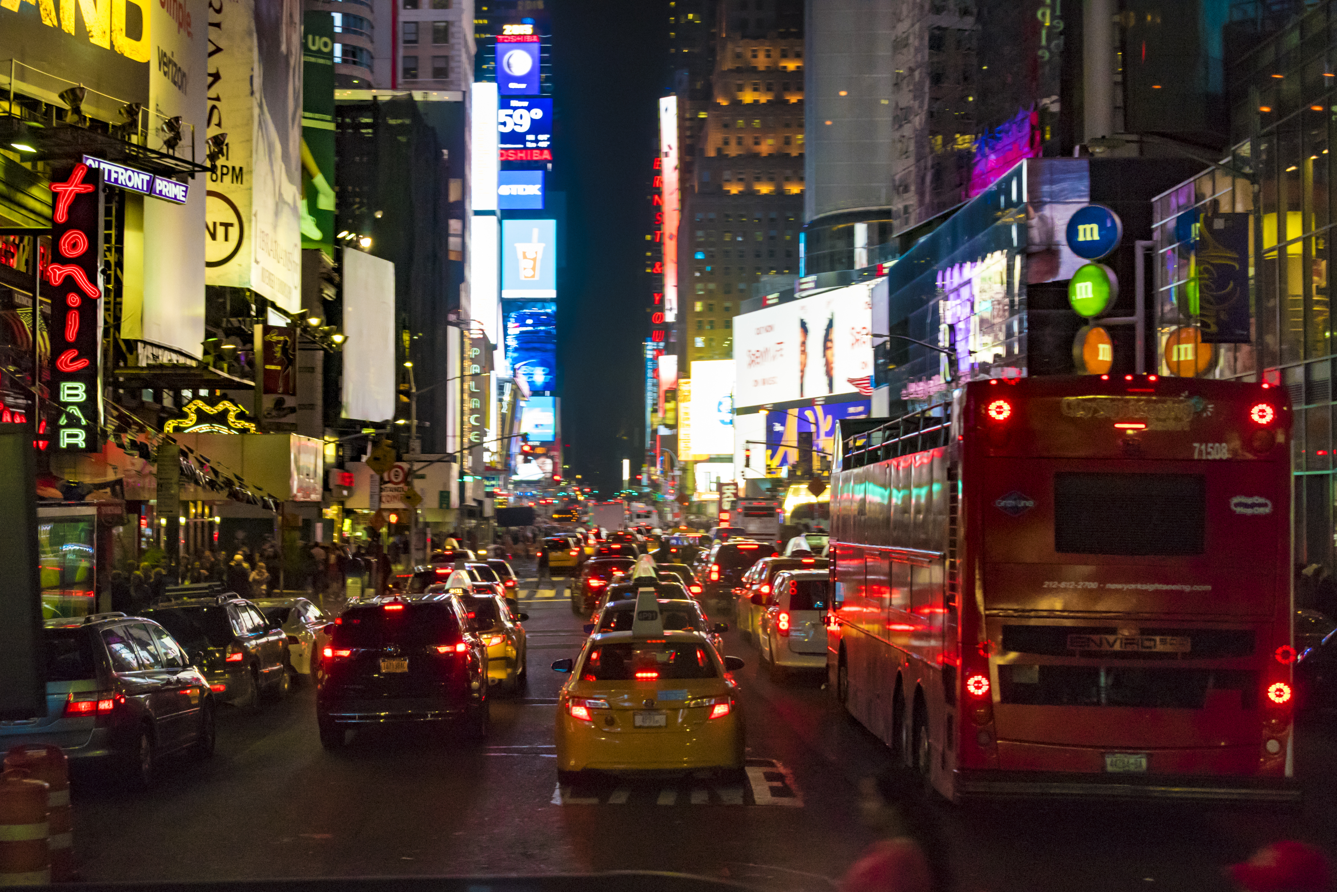 Night view of Times Square, New York city: Busy street with
