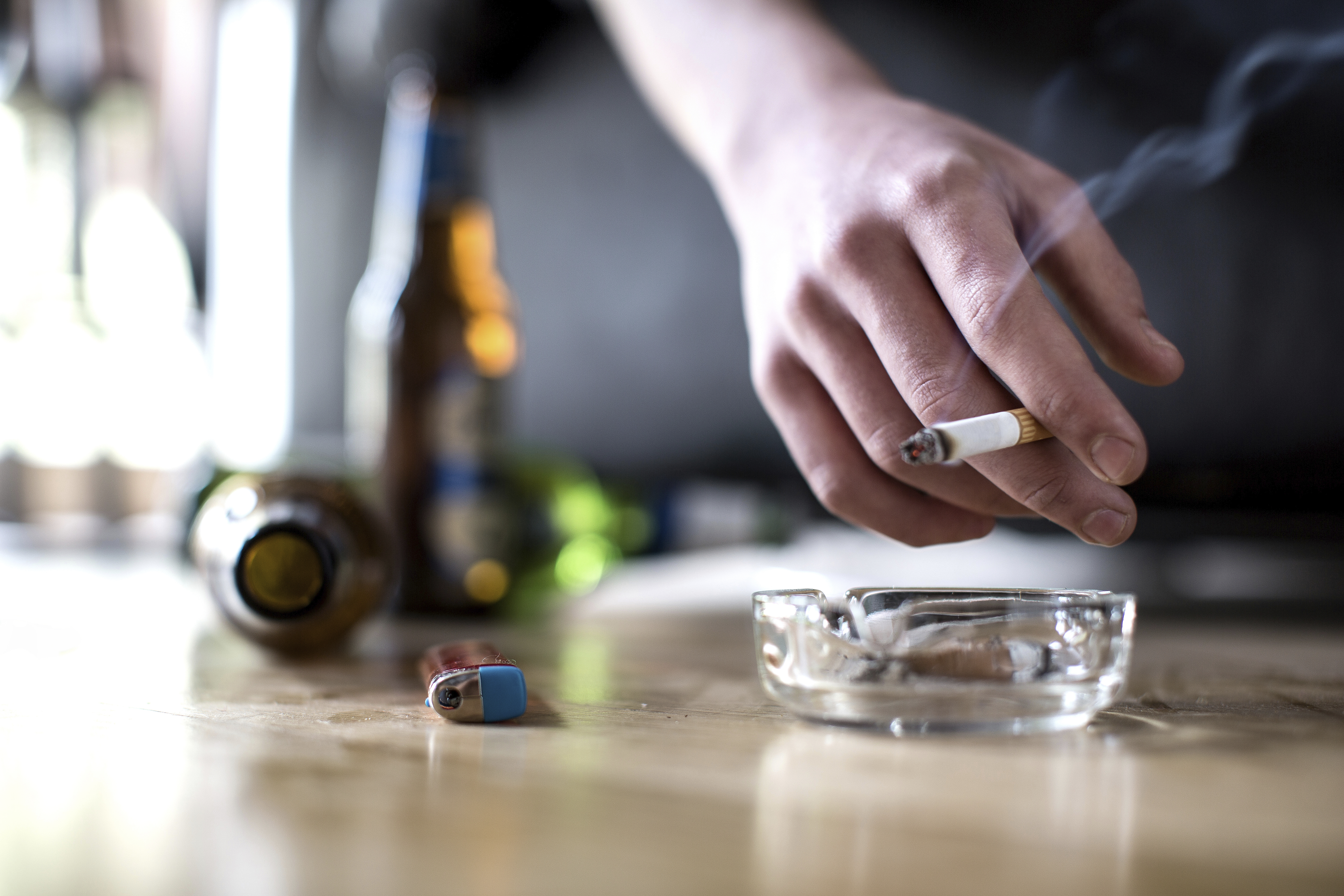Person holding cigarette