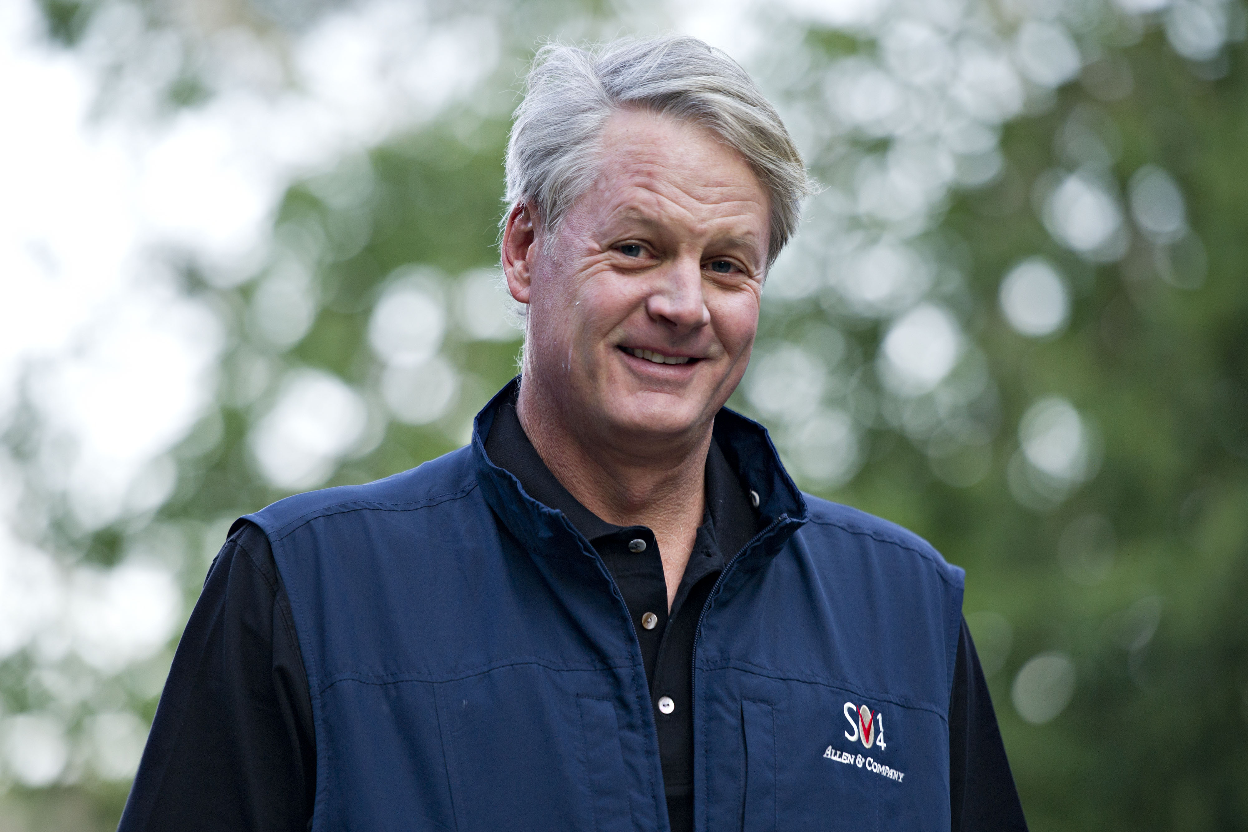 John Donahoe, chief executive officer of eBay Inc., arrives for a morning session during the Allen &amp; Co. Media and Technology Conference in Sun Valley, Idaho, U.S., on Friday, July 11, 2014. Technology companies