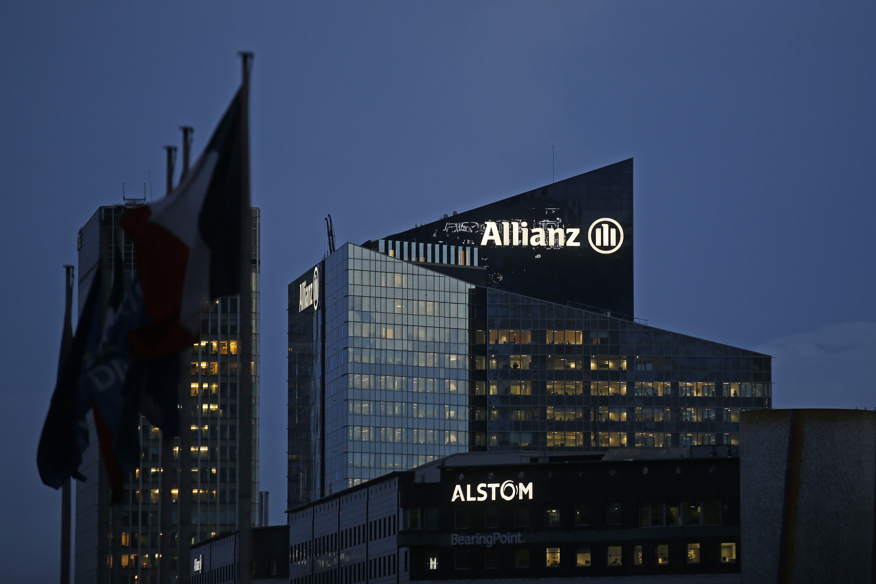 The logo of Europe's biggest insurer Allianz SE is seen on the company tower at La Defense business and financial district in Courbevoie