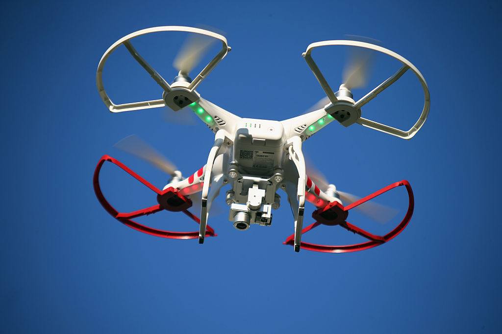 A drone is flown for recreational purposes in the sky above Old Bethpage, New York on September 5, 2015.
