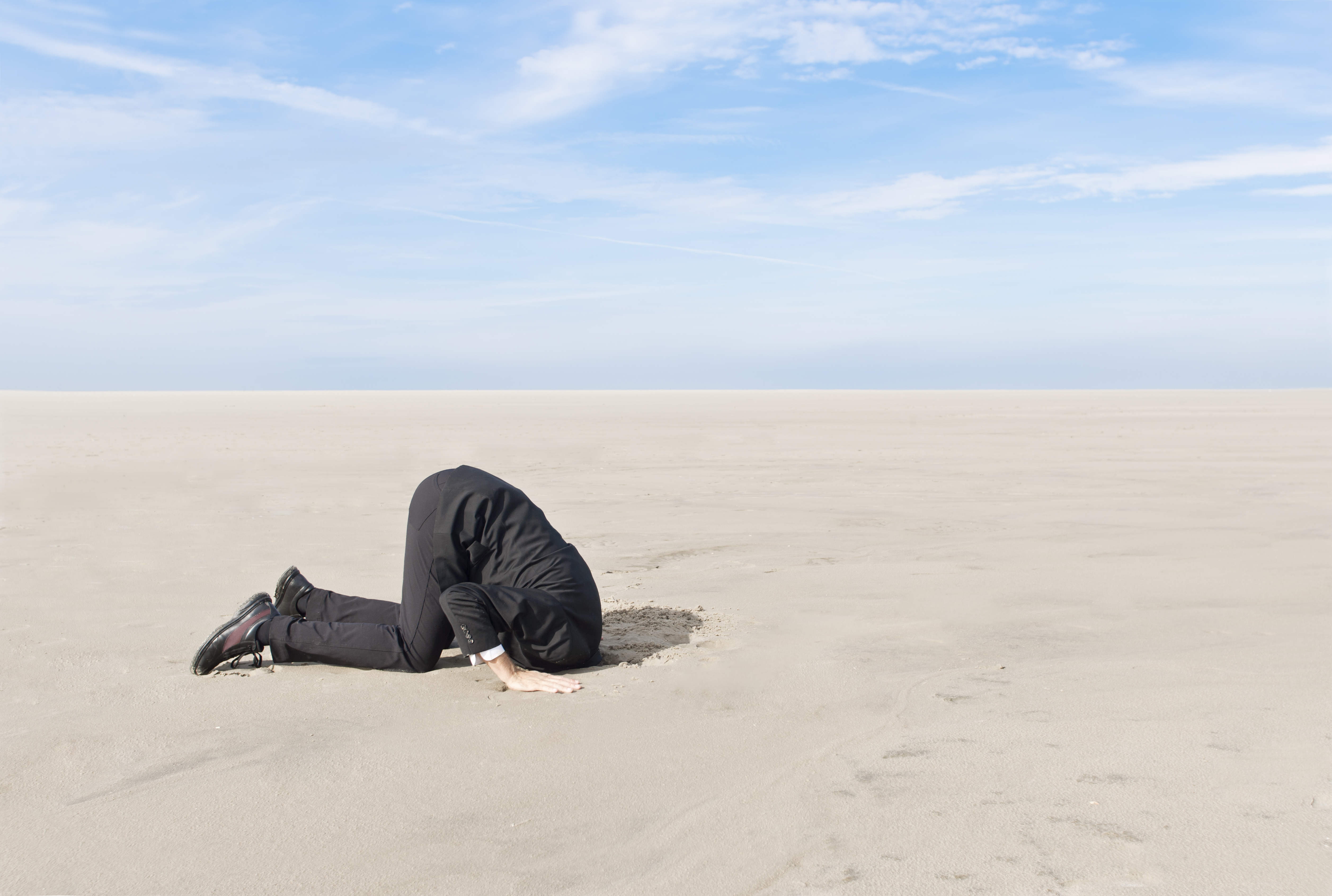 Hiding head in sand