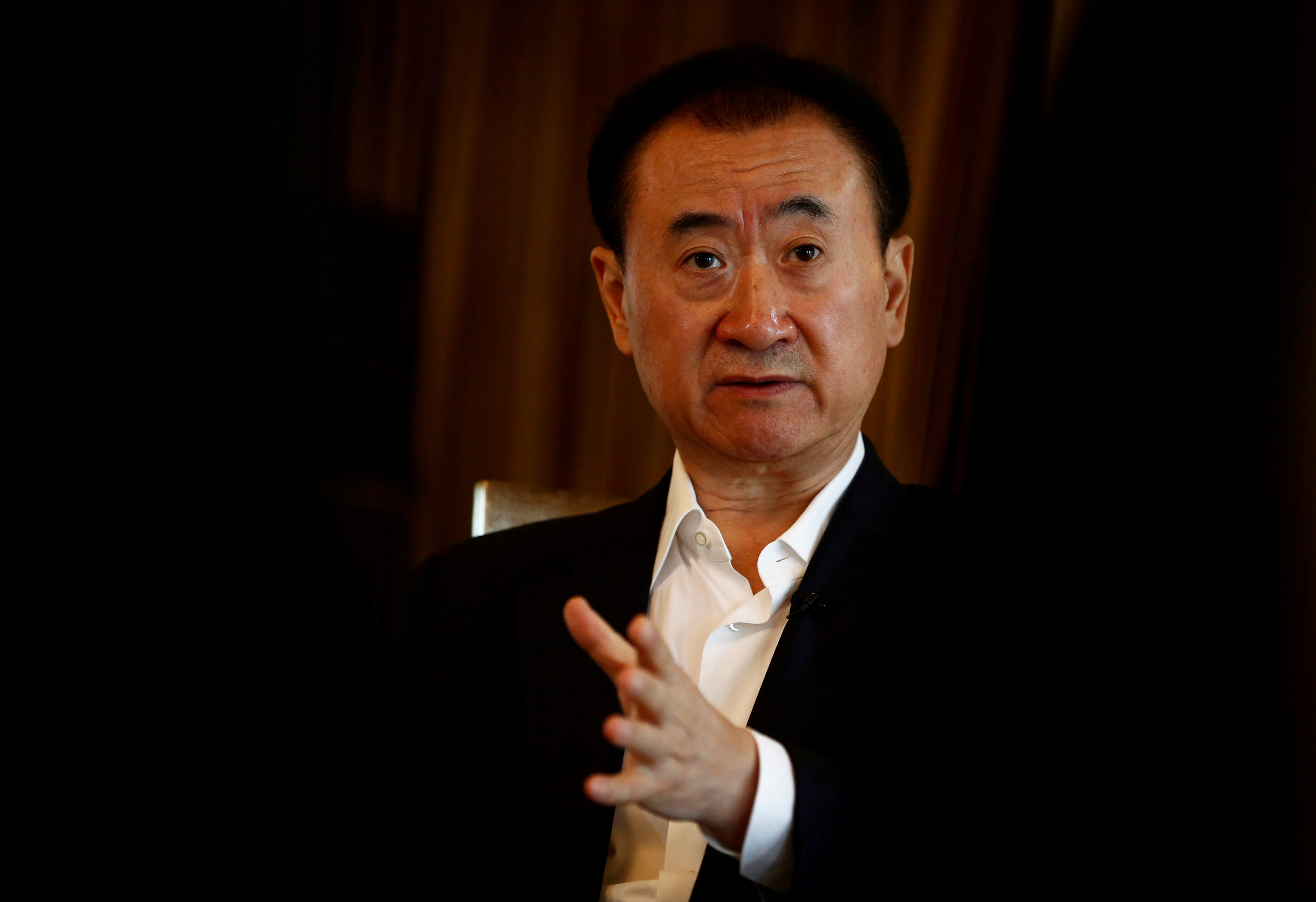 Wang Jianlin, chairman of the Wanda Group, speaks during an interview in Beijing