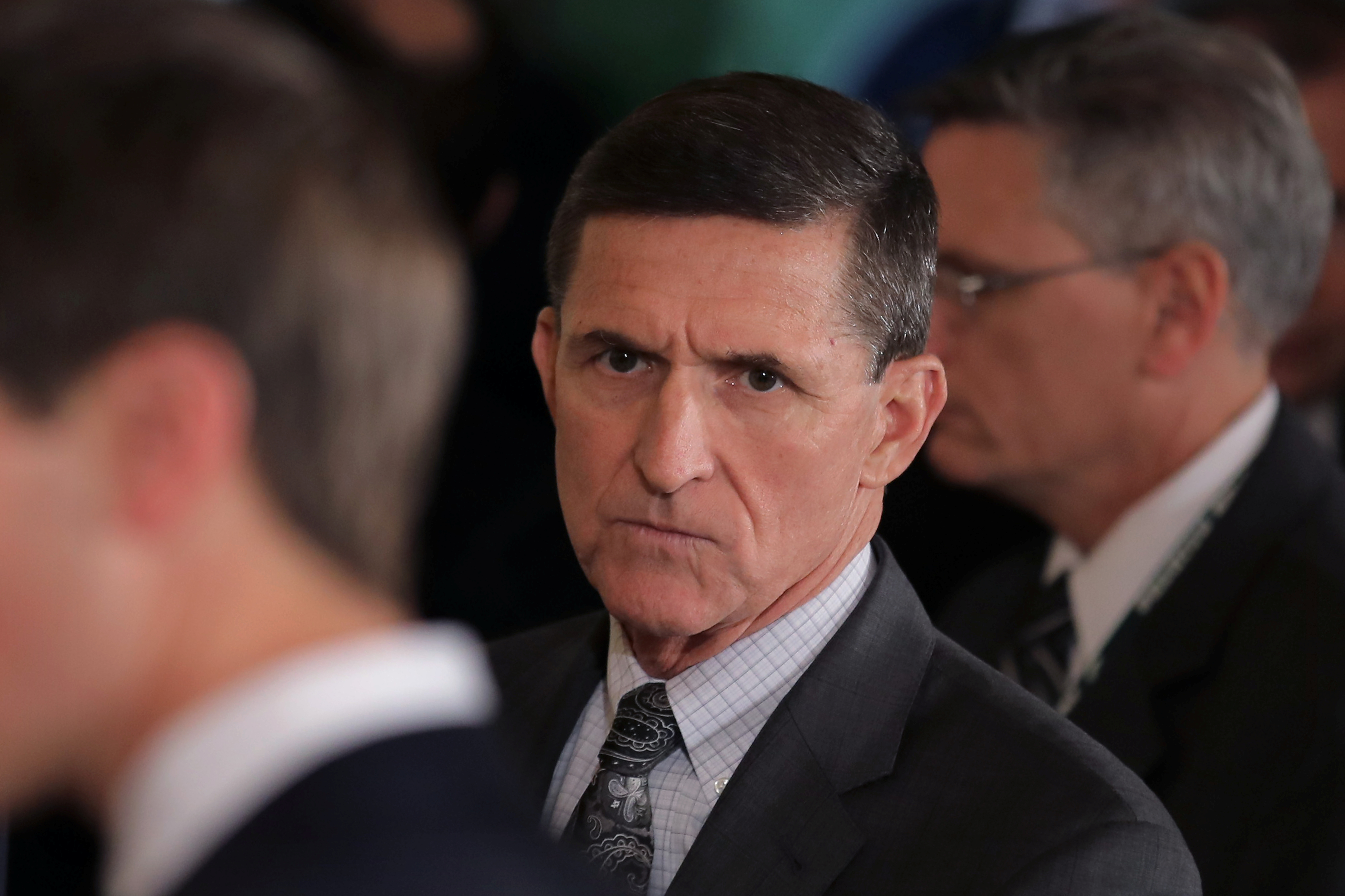 White House National Security Advisor Michael Flynn (C) arrives prior to a joint news conference between Canadian Prime Minister Justin Trudeau and U.S. President Donald Trump at the White House in Washington, U.S.