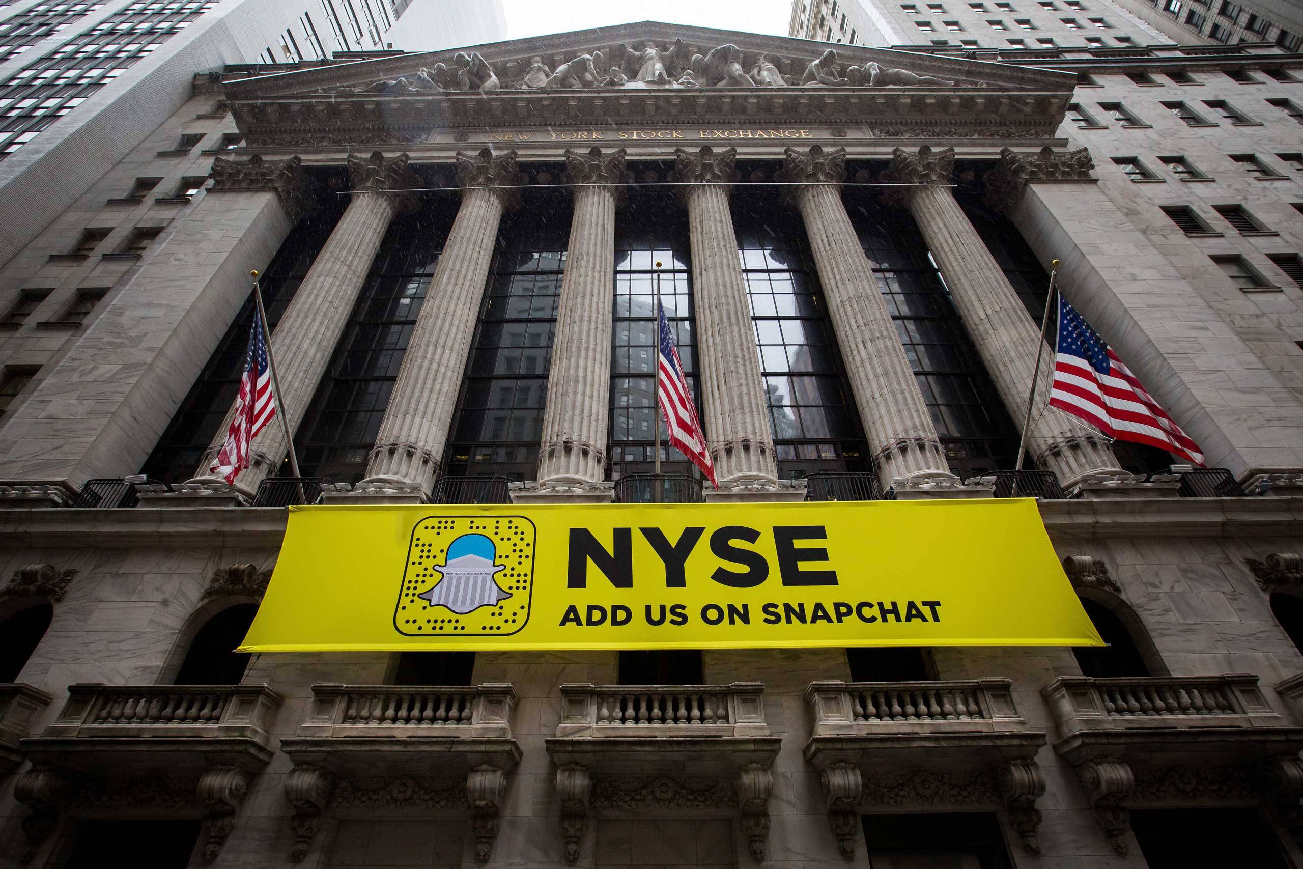 Trading On The Floor Of The NYSE As U.S. Stocks Trim Slide While Consumer Shares Rise On Deal Activity
