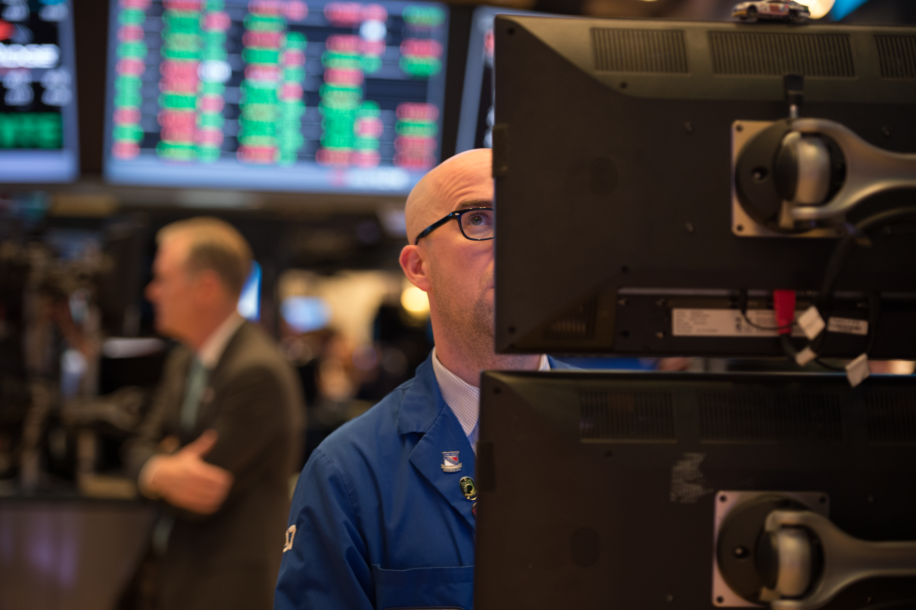 A trader works on the floor of the New York Stock Exchange.