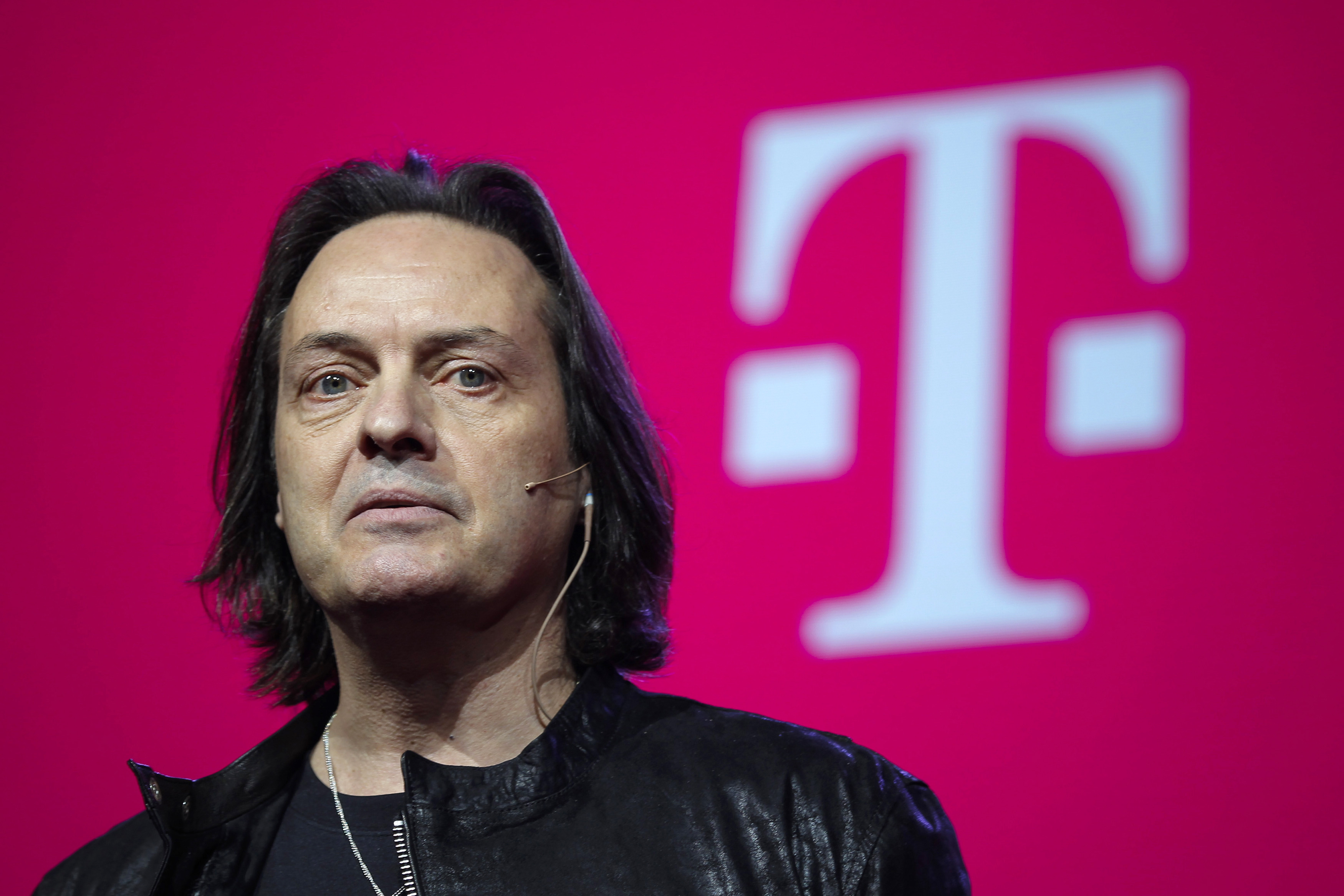 T-Mobile CEO Legere speaks to guests during their company's Un-carrier 9.0 event in New York