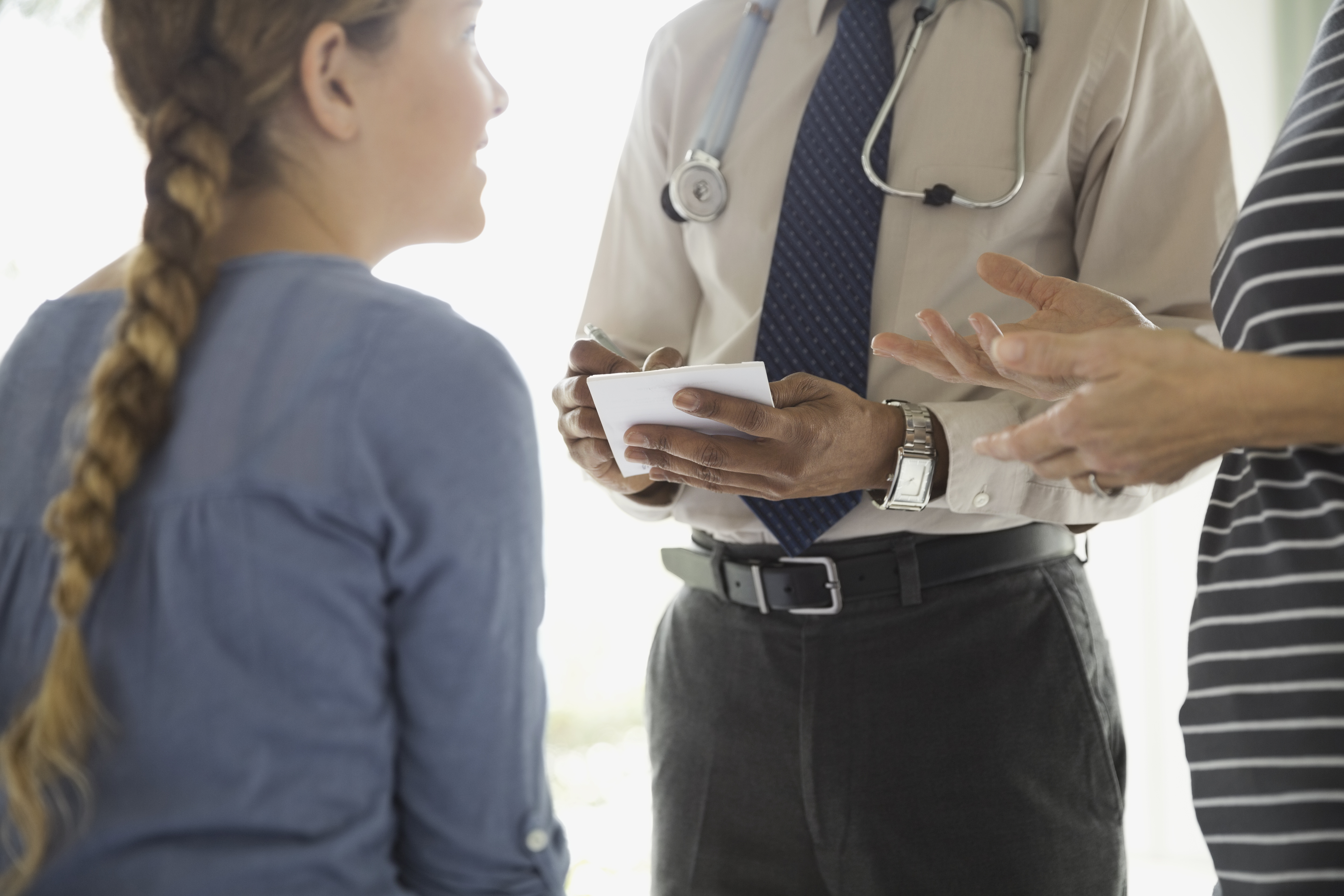Mother having a conversation with doctor