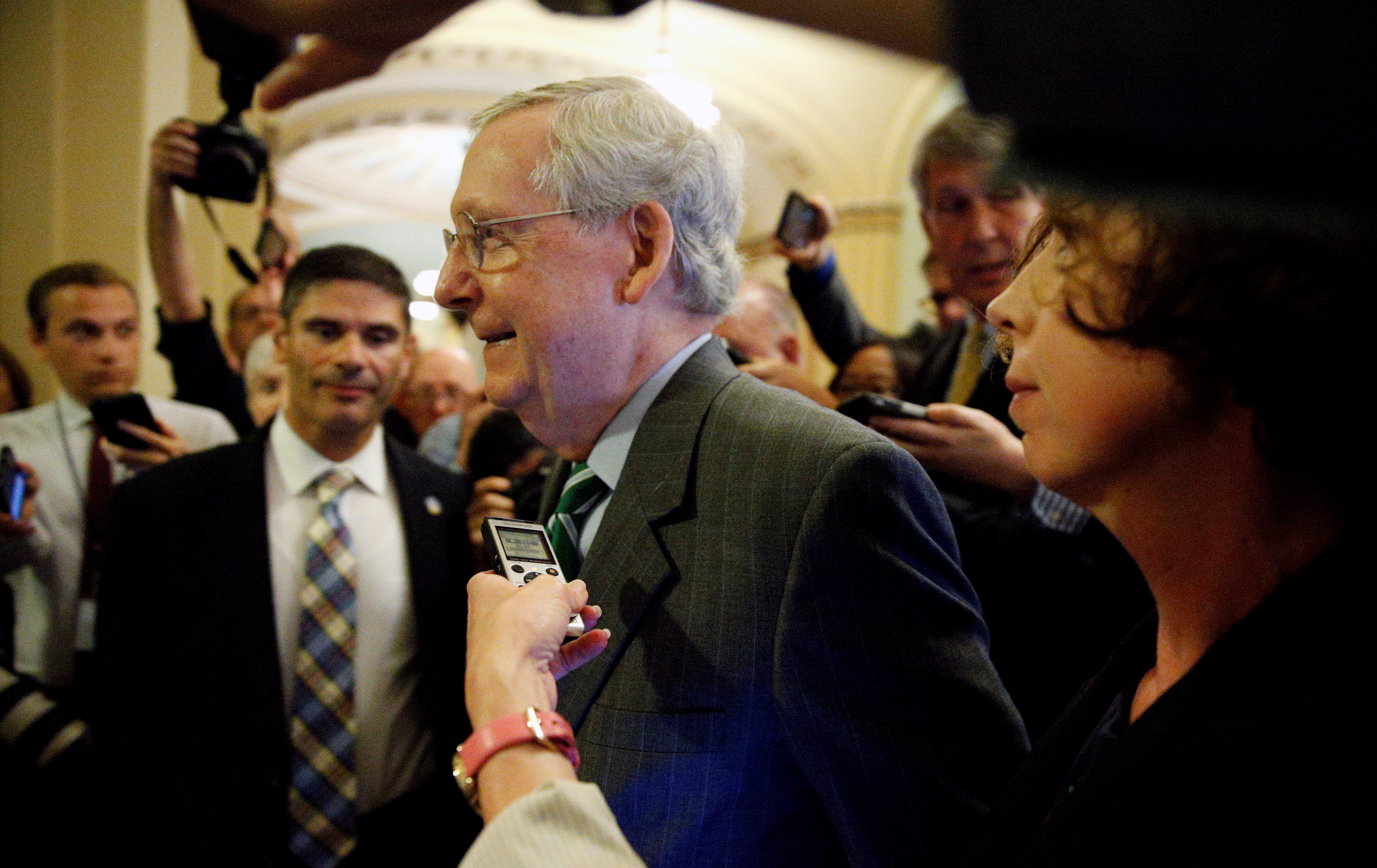 Mitch McConnell walks to the Senate floor in the Capitol in Washington