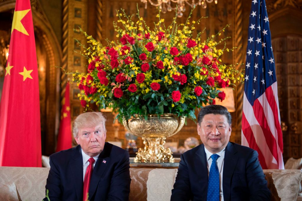 FILES-US-POLITICS-TRUMP-100DAYS