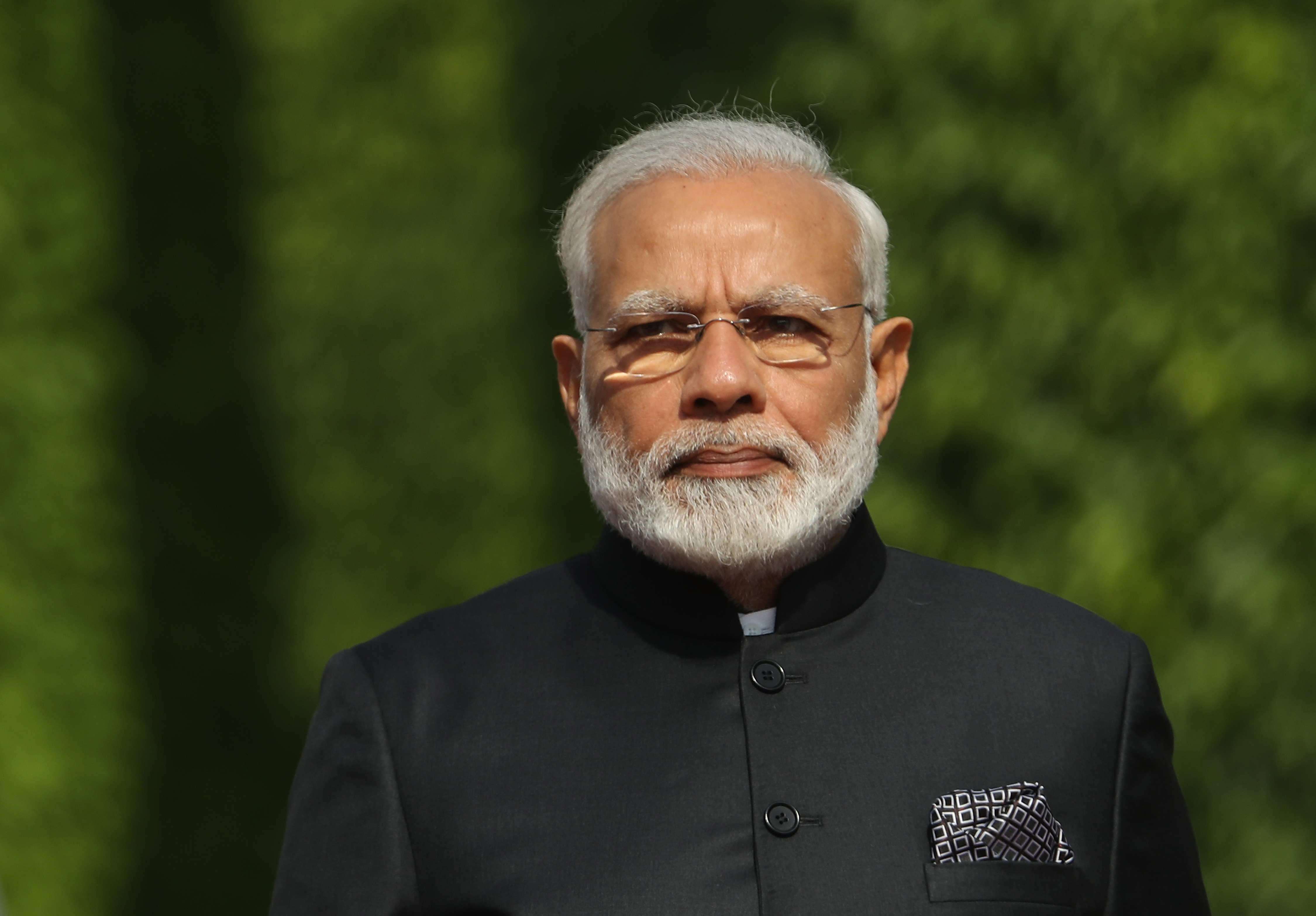 Indian Prime Minister Narendra Modi and German Chancellor Angela Merkel (not pictured) arrive to review a guard of honor prior to consultations between the German and Indian governments at the Chancellery on May 30, 2017 in Berlin, Germany.