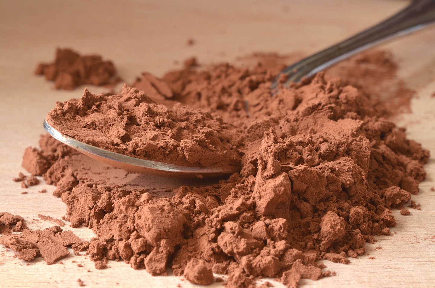 Spoon in brown powder