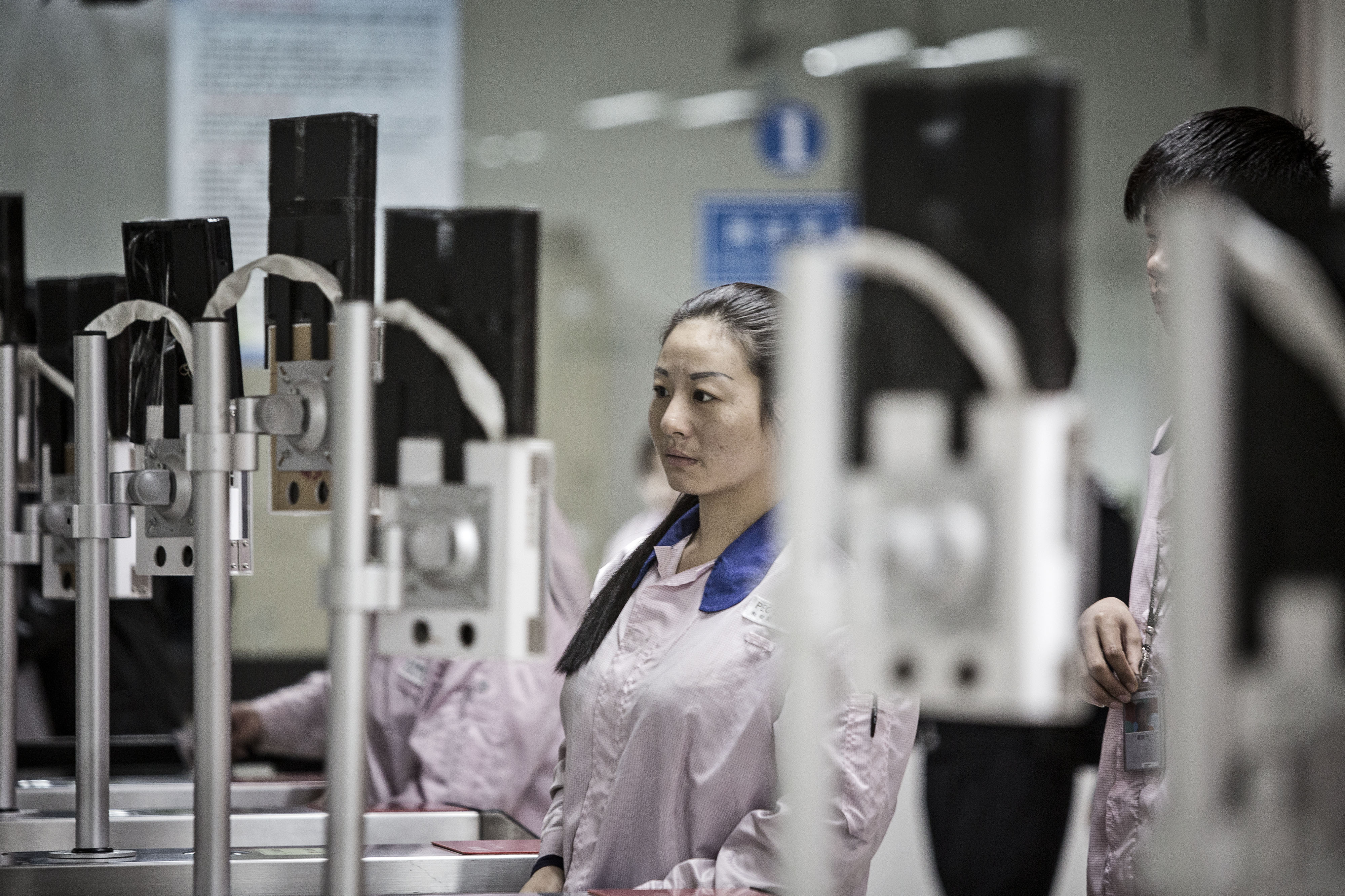 Workers Inside The Pegatron Corp. Factory in Shanghai