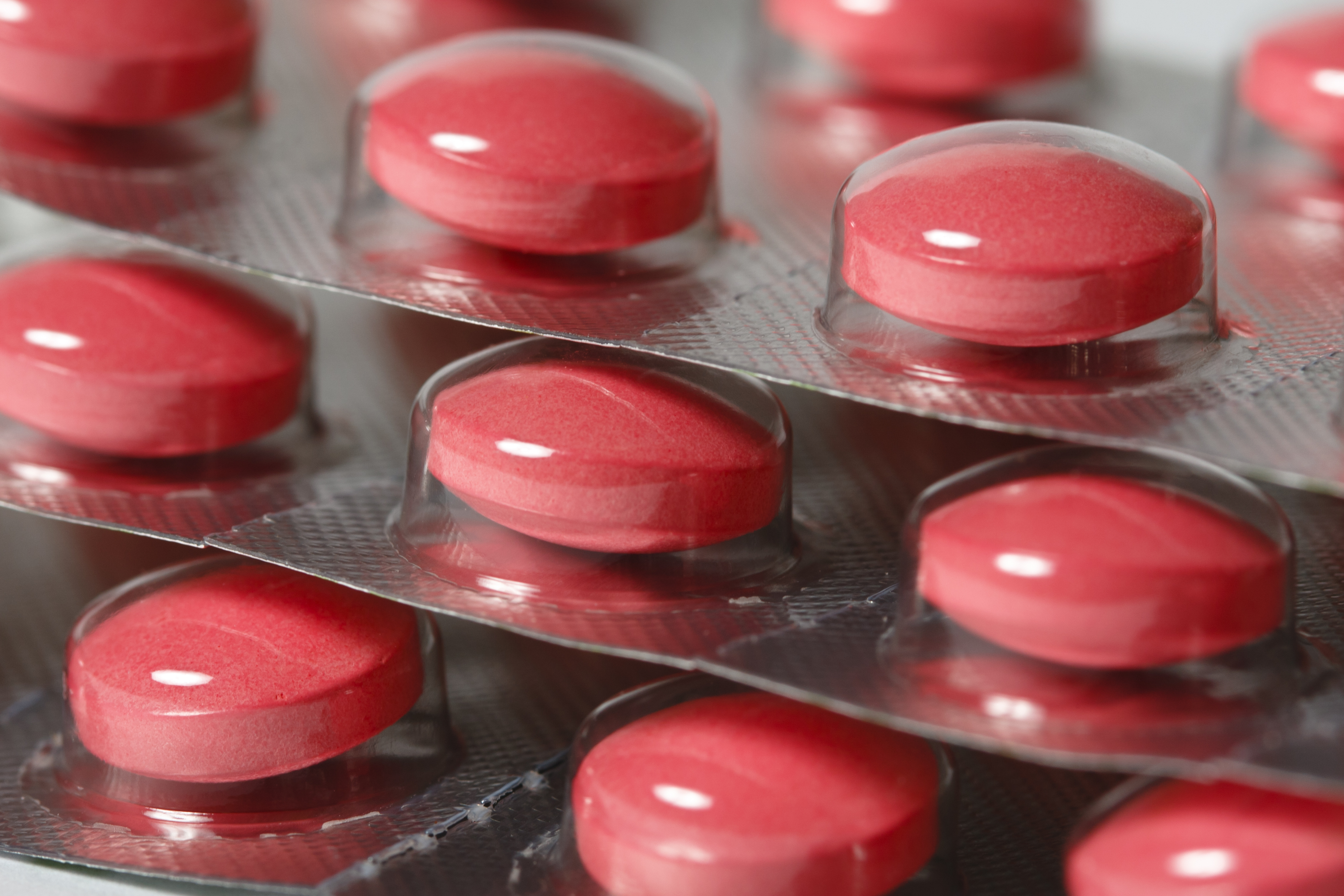 Close up of blister packs red pills