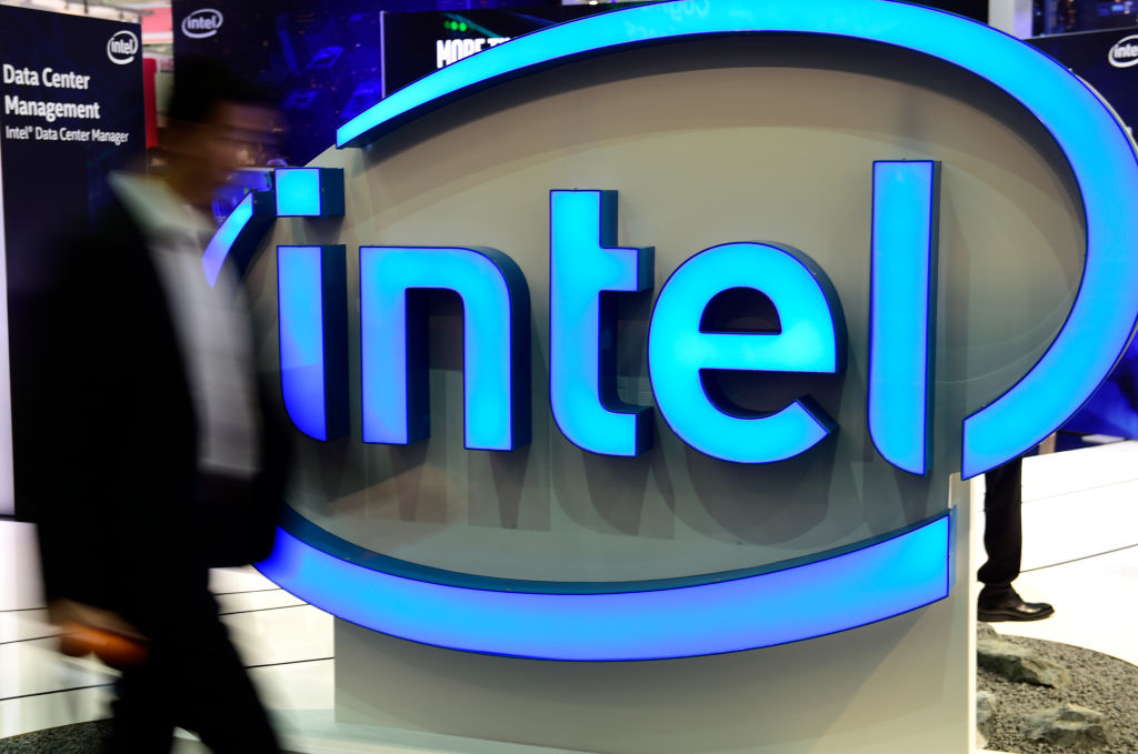 A visitor walks by the Intel stand at the CeBIT 2017 Technology Trade Fair on March 20, 2017 in Hanover, Germany.