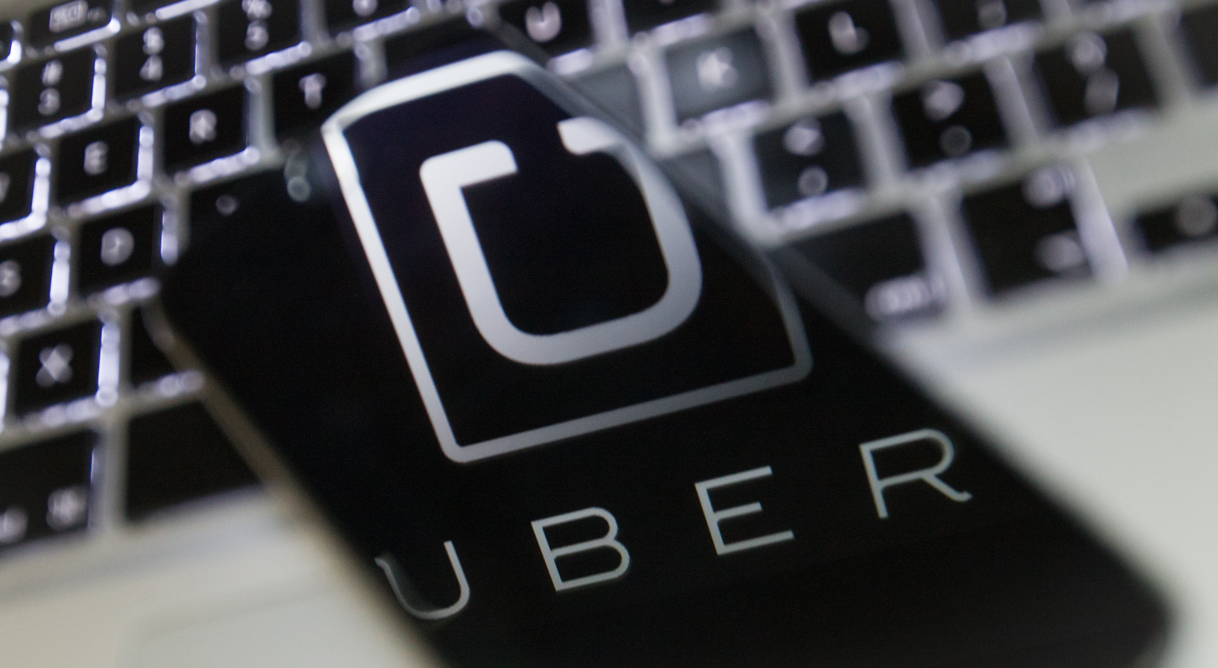 Uber logo reflection.