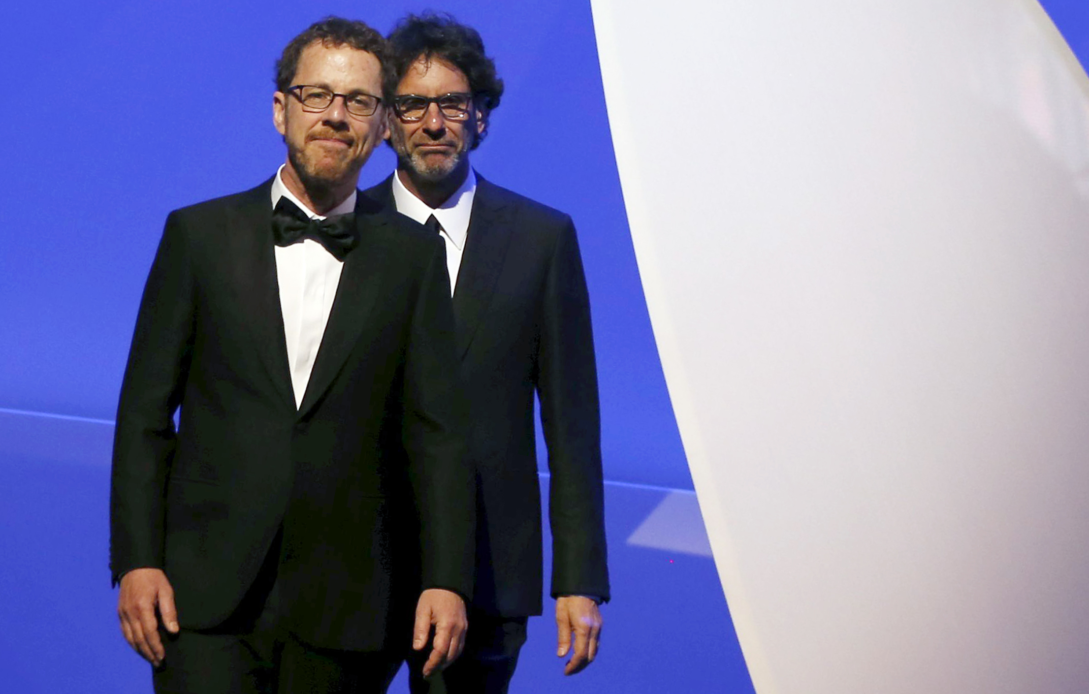 American writer and director brothers Joel and Ethan Coen, Jury Presidents of the 68th Cannes Film Festival, arrive on stage during the opening ceremony at the 68th Cannes Film Festival in Cannes