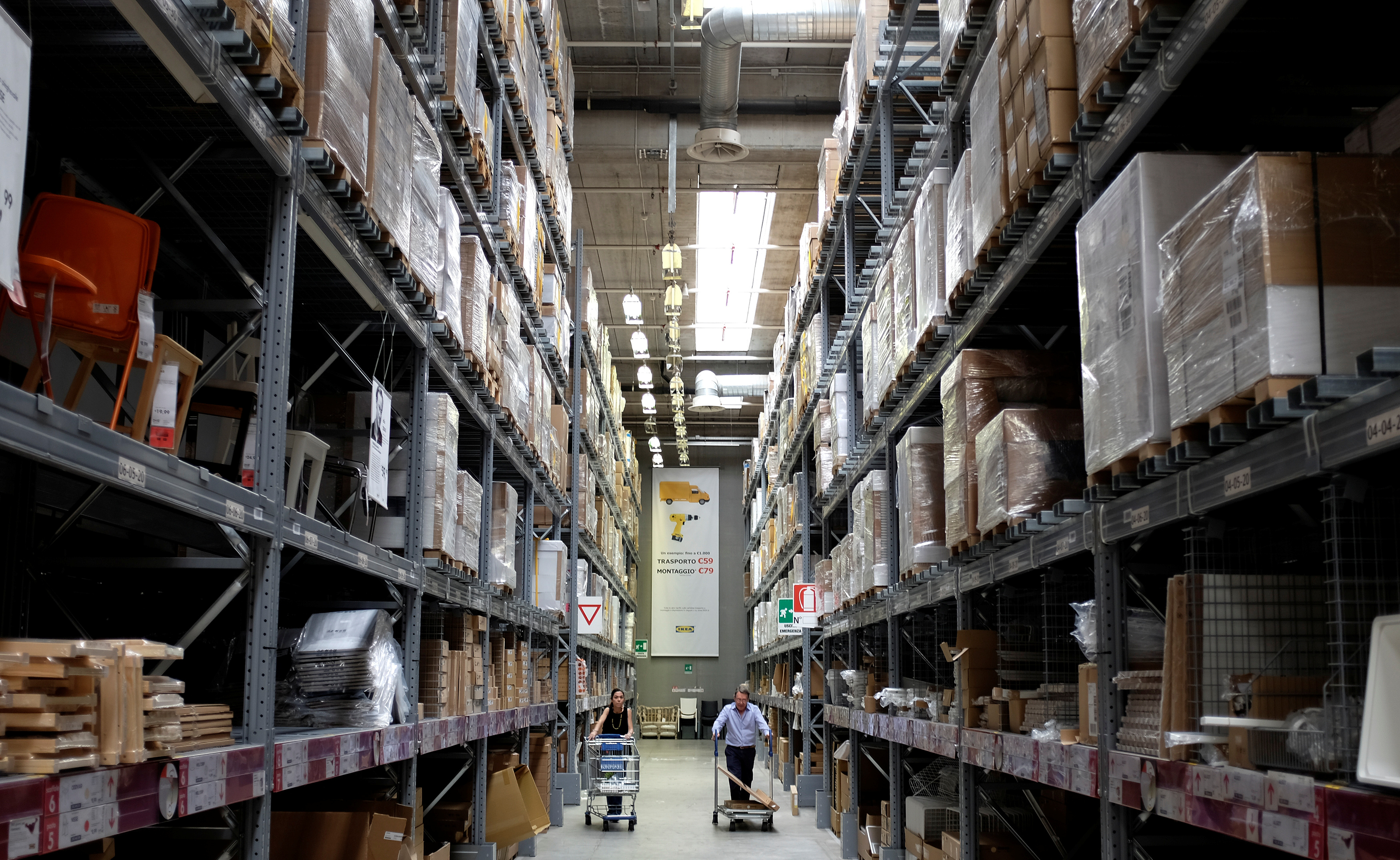 People are seen in an Ikea shop in a mall in Rome