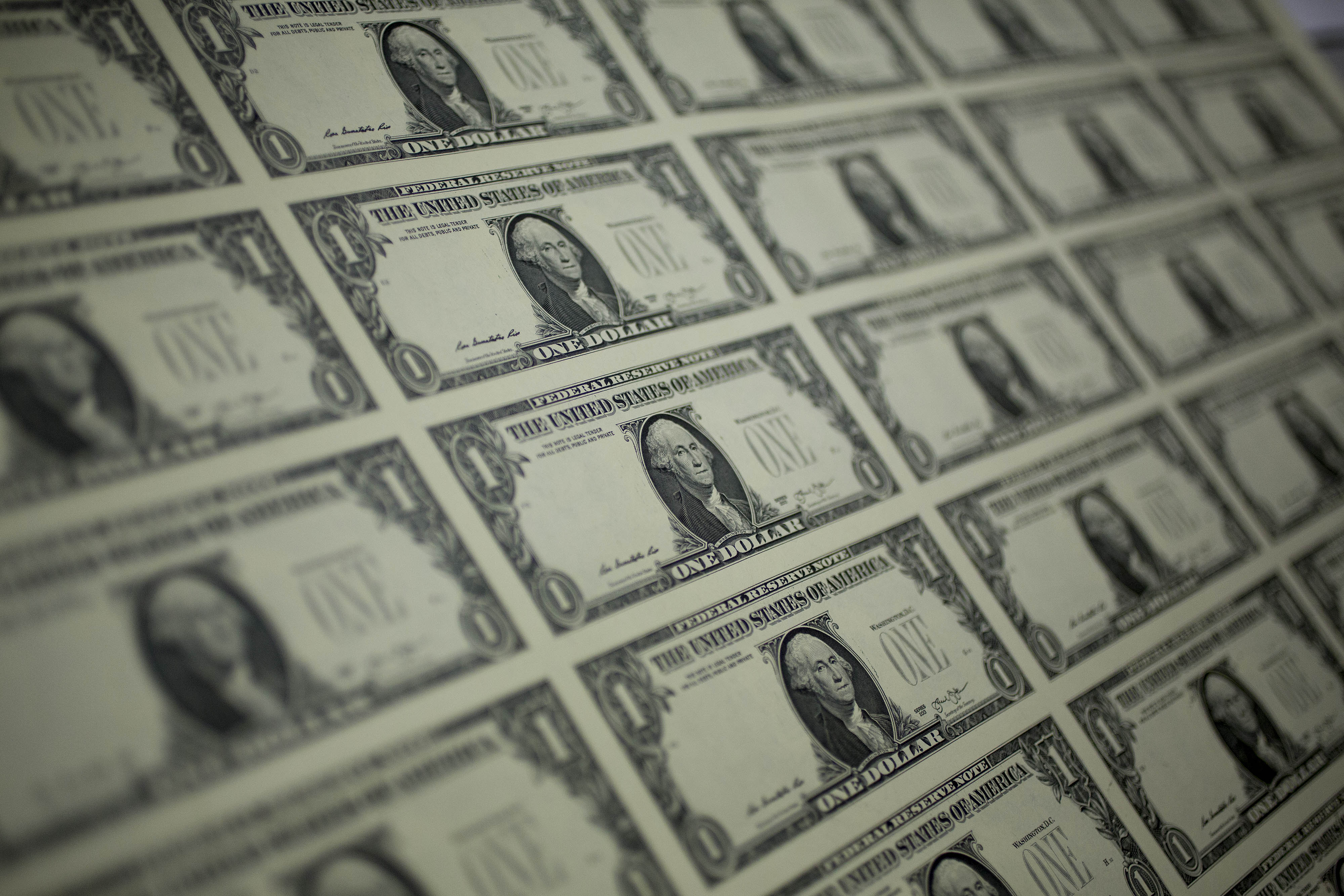 Operations At The Bureau Of Engraving And Printing As The $1 Bill Is Printed